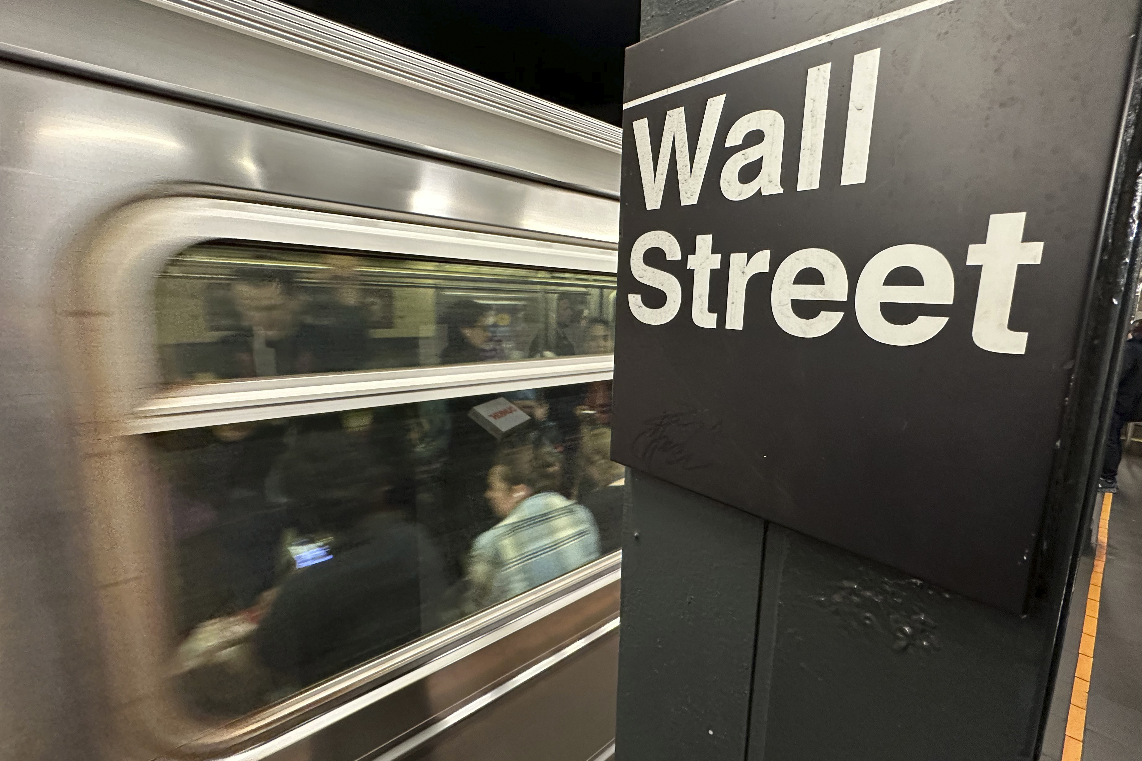 FILE - A train arrives at a Wall Street subway station in New York's Financial District on Nov. 5, 2024. (AP Photo/Peter Morgan, File)