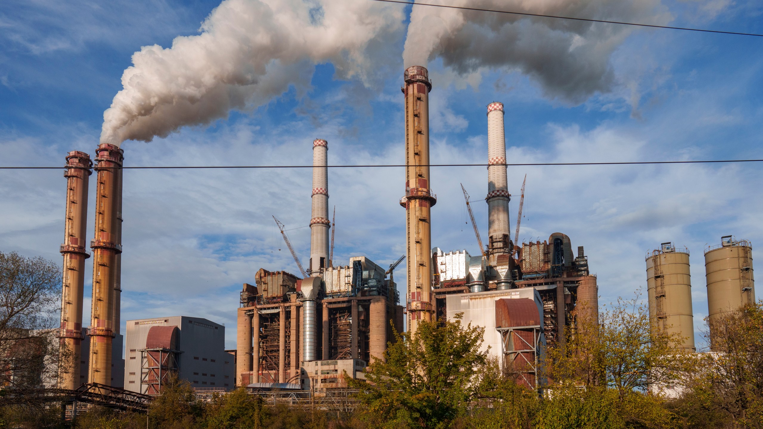 Rovinari, a plant that produces electricity from coal, operates in Rovinari, southern Romania, Friday, Oct. 11, 2024. (AP Photo/Vadim Ghirda)