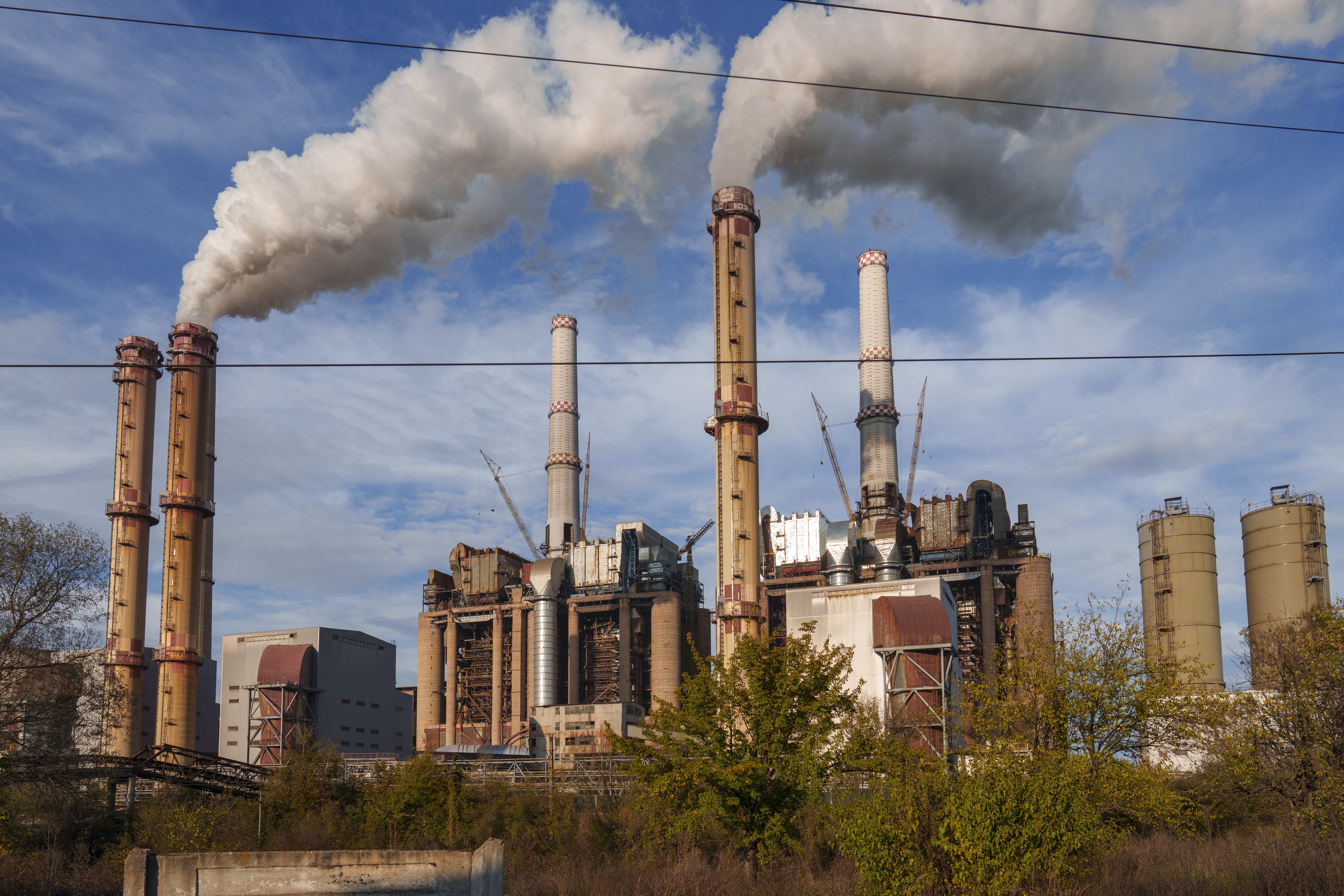 Rovinari, a plant that produces electricity from coal, operates in Rovinari, southern Romania, Friday, Oct. 11, 2024. (AP Photo/Vadim Ghirda)