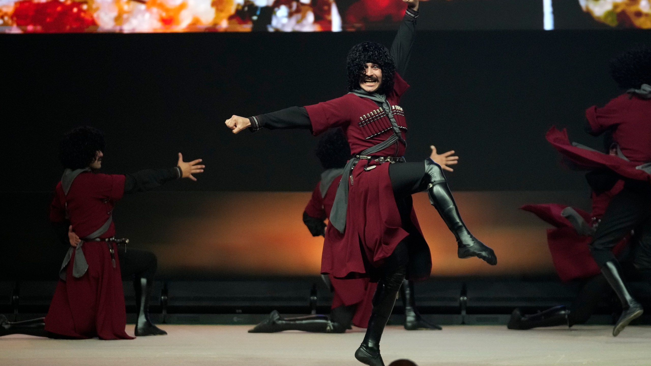 Dancers perform at the COP29 U.N. Climate Summit, Tuesday, Nov. 12, 2024, in Baku, Azerbaijan. (AP Photo/Rafiq Maqbool)