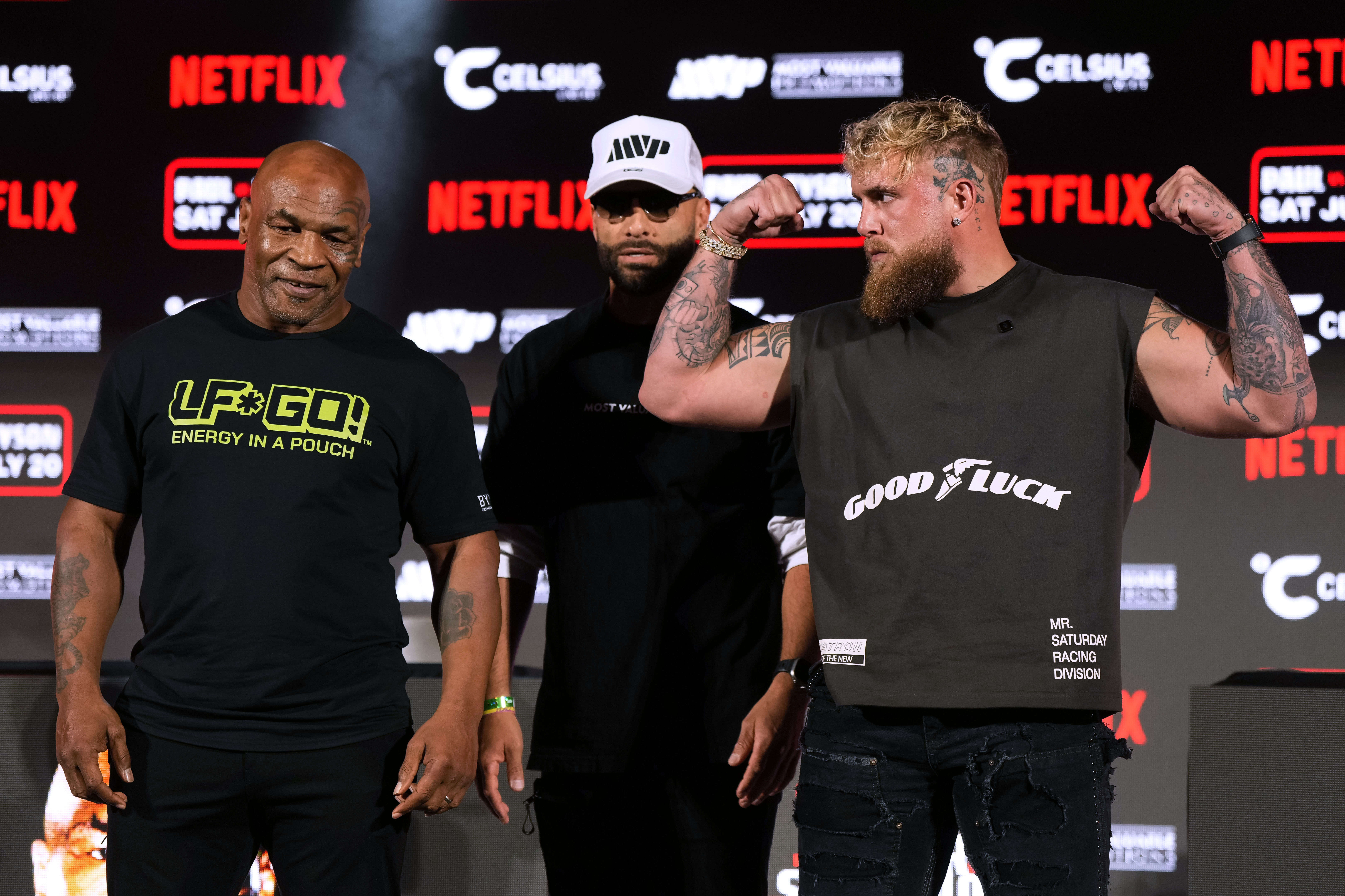 FILE - Mike Tyson, left, and Jake Paul, right, pose for photos during a news conference promoting their upcoming boxing bout, Thursday, May 16, 2024, in Arlington, Texas. (AP Photo/Sam Hodde, File)