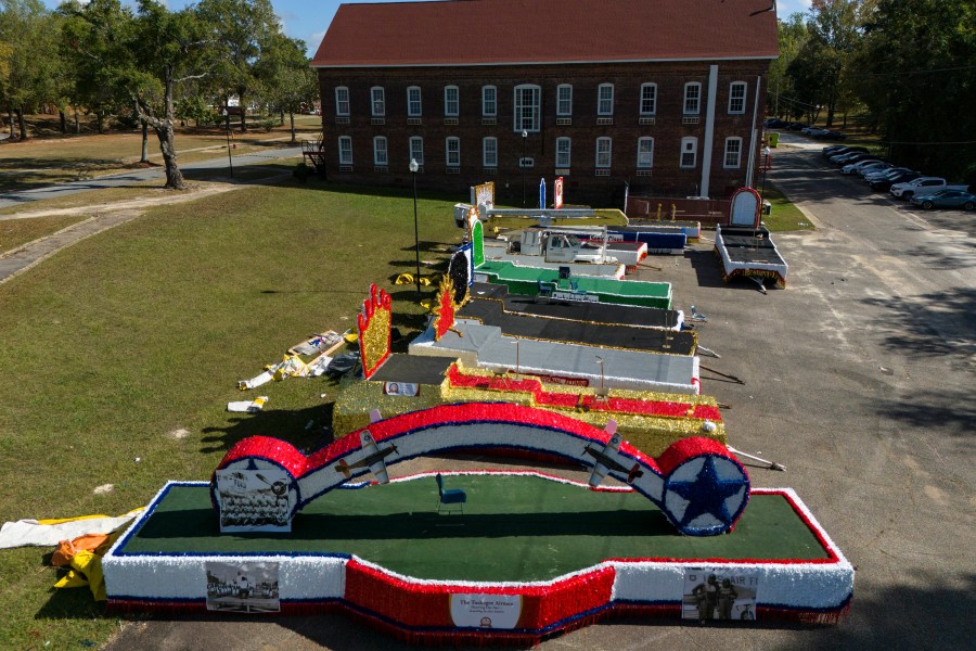 Homecoming parade floats sit on the campus of Tuskegee University a day after a shooting occurred, Monday, Nov. 11, 2024, in Tuskegee, Ala. (AP Photo/Mike Stewart)