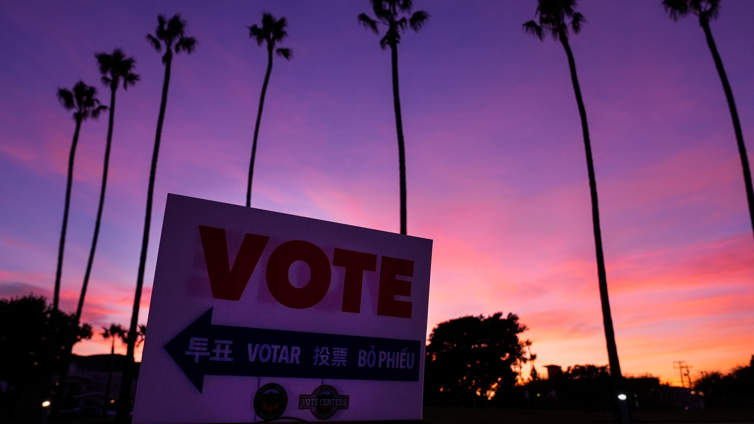 A sign directs the way to a polling place at Marina Park Community Center on Tuesday, Nov. 5, 2024, in Newport Beach, Calif. (AP Photo/Ashley Landis)