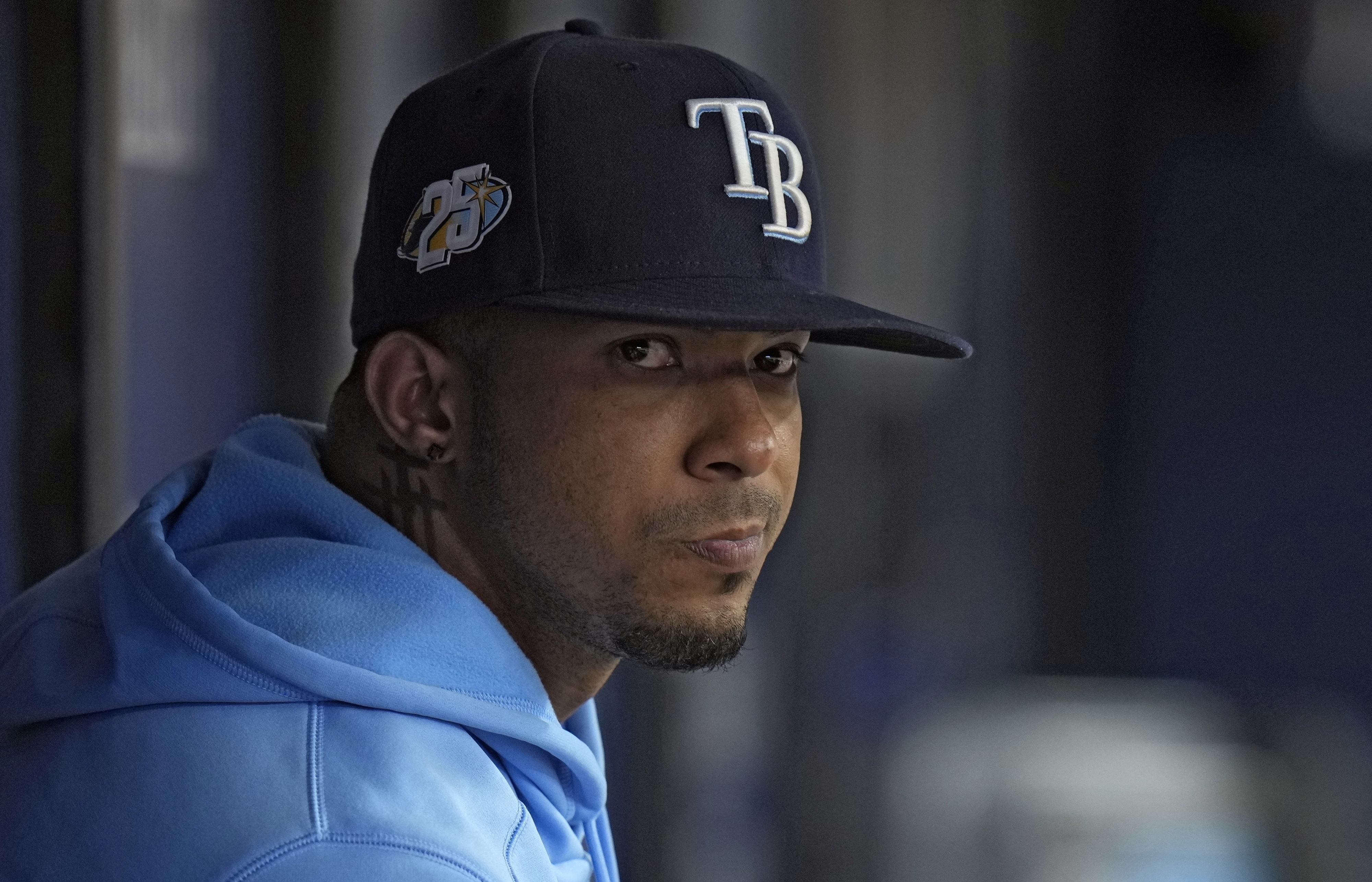 FILE - Tampa Bay Rays shortstop Wander Franco watches from the dugout during the fifth inning of a baseball game against the Cleveland Guardians, Aug. 13, 2023, in St. Petersburg, Fla. (AP Photo/Chris O'Meara, File)