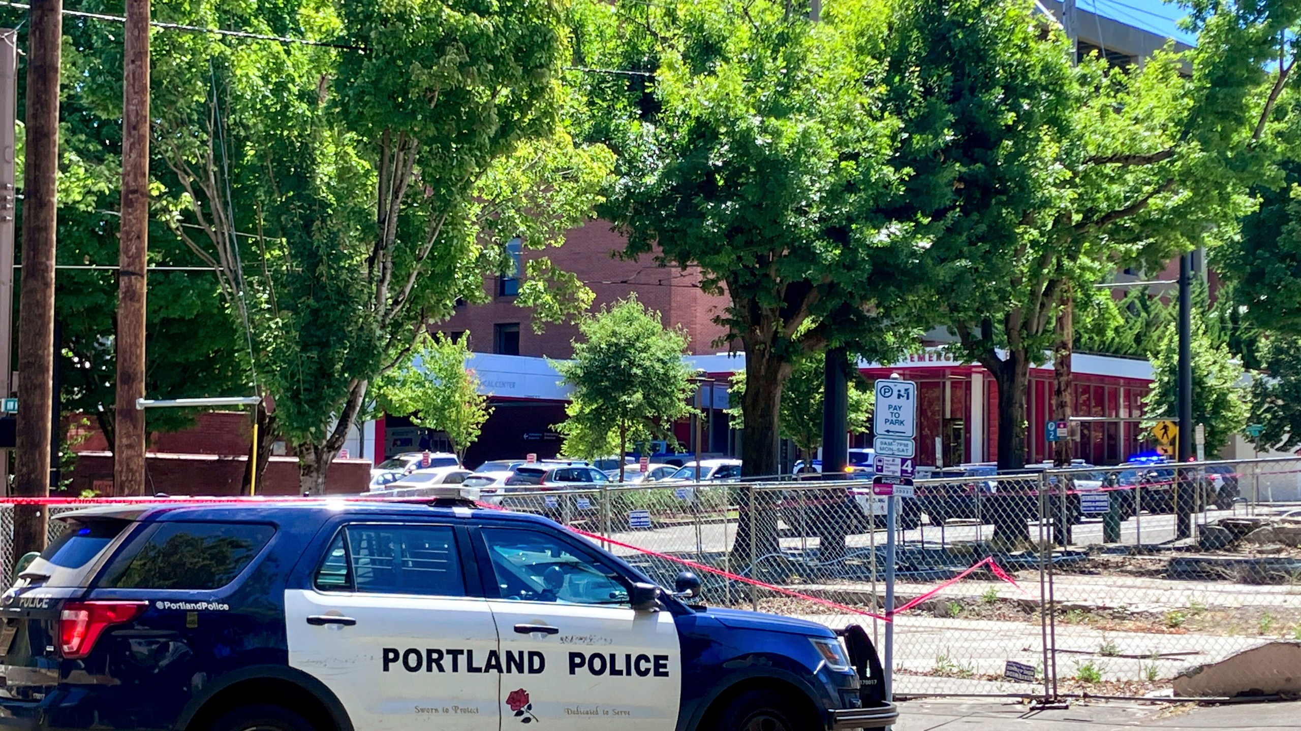 FILE - Portland Police respond to a shooting at the Legacy Good Samaritan Medical Center in Portland, Ore., July 22, 2023. (Maxine Bernstein/The Oregonian via AP, File)