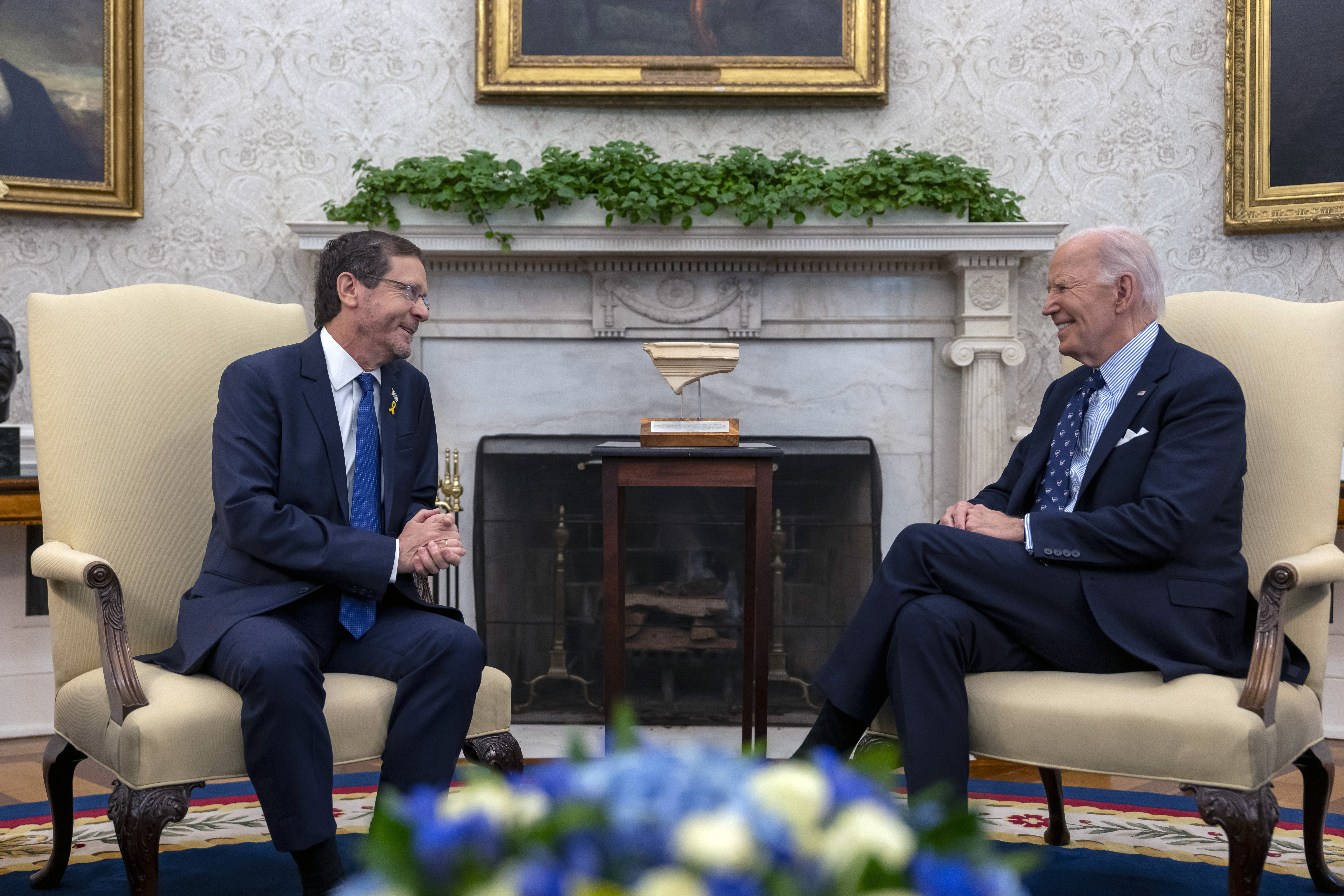 President Joe Biden meets with Israel's President Isaac Herzog, left, in the Oval Office of the White House in Washington, Tuesday, Nov. 12, 2024. (AP Photo/Ben Curtis)