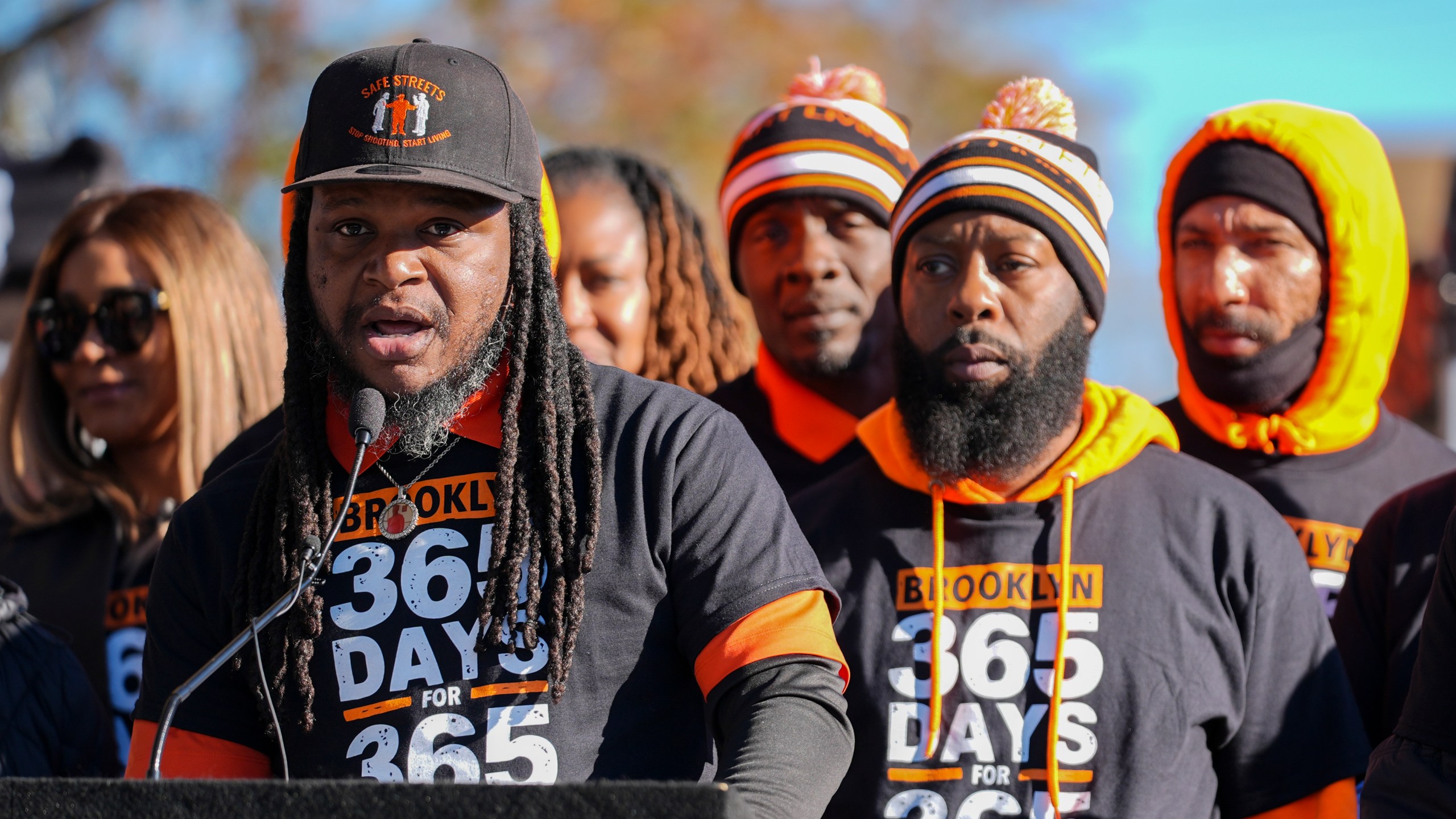 Sean Wees, director of Safe Streets' Brooklyn site, speaks during a press conference to celebrate achieving over 365 days without a homicide within the Brooklyn neighborhood Safe Streets catchment zone, Tuesday, Nov. 12, 2024, in Baltimore. (AP Photo/Stephanie Scarbrough)