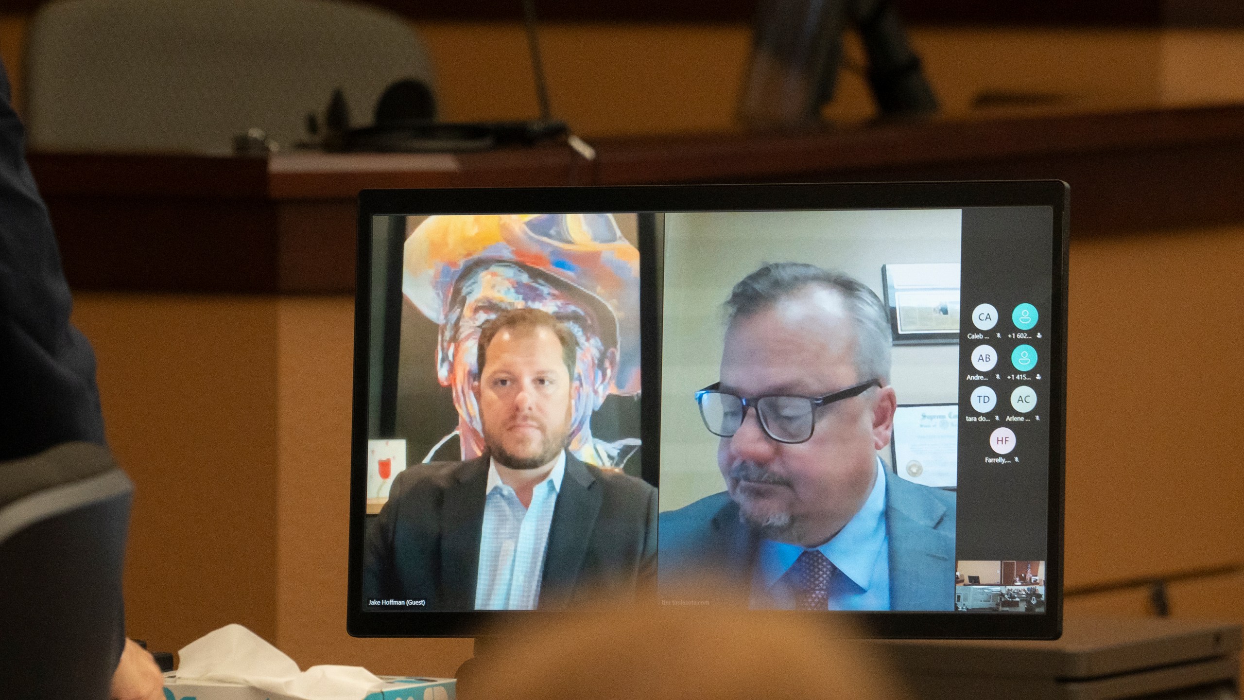 FILE - Arizona Rep. Jake Hoffman, R-Queen Creek, left, and his attorney Timothy La Sota appear virtually for Hoffman's arraignment in Maricopa County Superior Court in Phoenix, June 6, 2024. (Mark Henle/The Arizona Republic via AP, Pool, File)