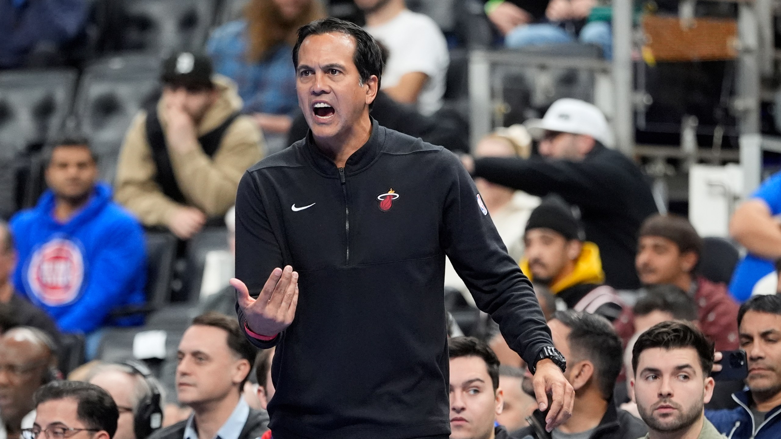 Miami Heat head coach Erik Spoelstra yells during the first half of an Emirates NBA Cup basketball game against the Detroit Pistons, Tuesday, Nov. 12, 2024, in Detroit. (AP Photo/Carlos Osorio)