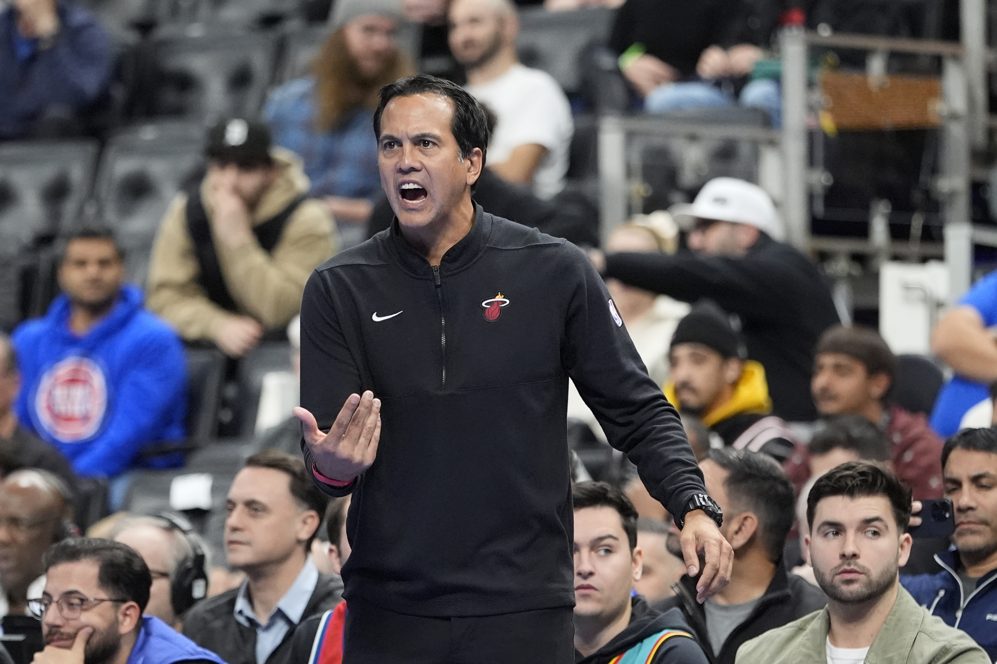 Miami Heat head coach Erik Spoelstra yells during the first half of an Emirates NBA Cup basketball game against the Detroit Pistons, Tuesday, Nov. 12, 2024, in Detroit. (AP Photo/Carlos Osorio)