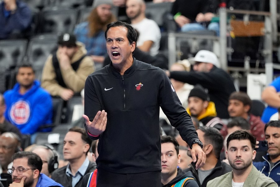 Miami Heat head coach Erik Spoelstra yells during the first half of an Emirates NBA Cup basketball game against the Detroit Pistons, Tuesday, Nov. 12, 2024, in Detroit. (AP Photo/Carlos Osorio)