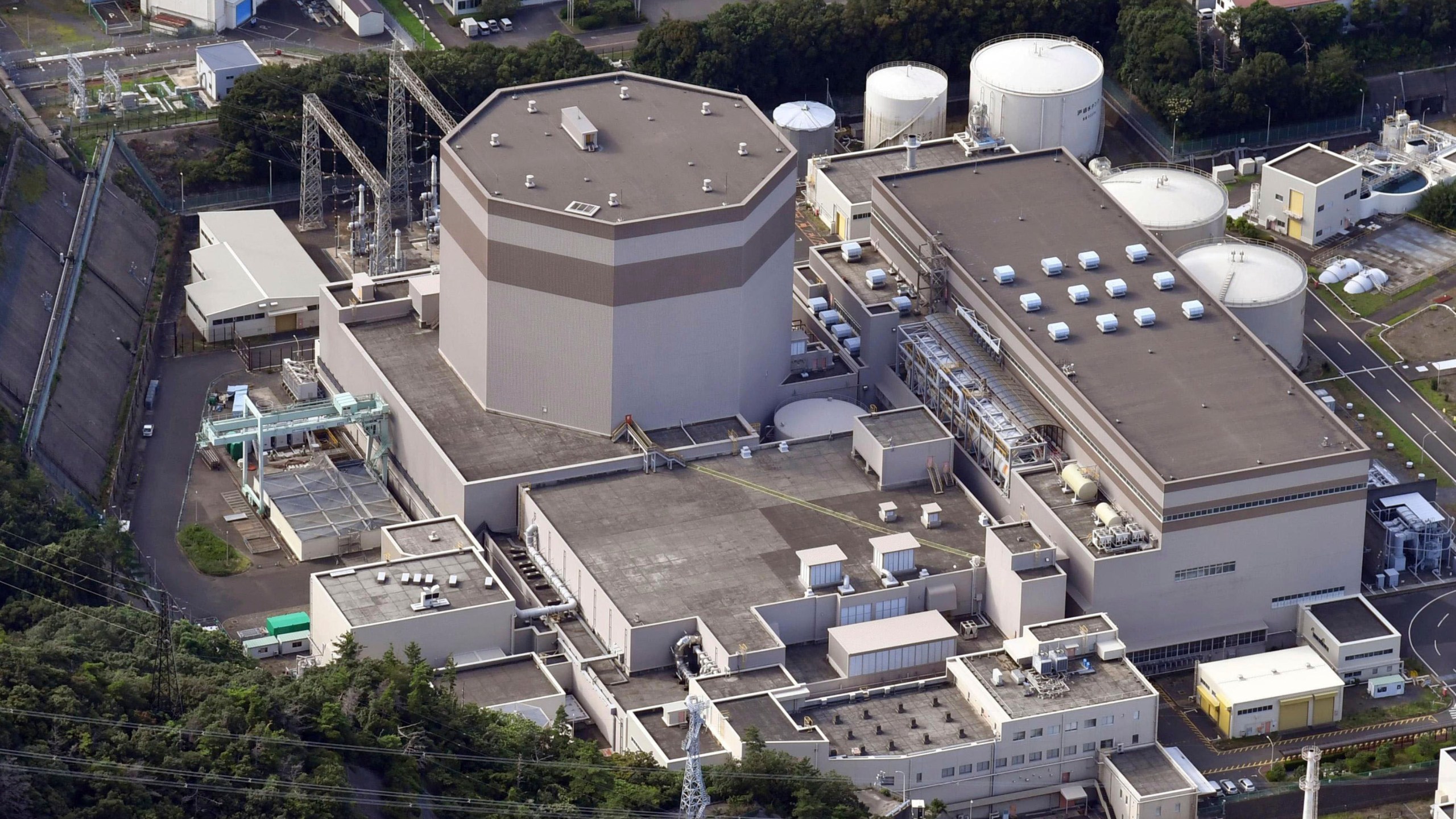 The No. 2 reactor building of the Tsuruga nuclear power plant is seen in Tsuruga, Fukui prefecture, on the Sea of Japan coast on July, 2024.(Kyodo News via AP)