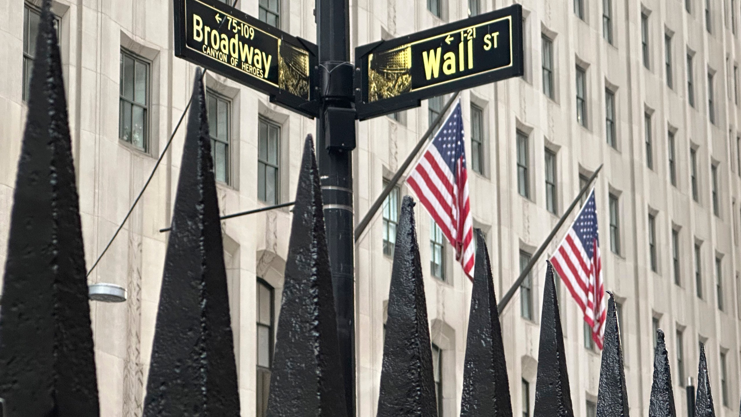 FILE - A sign marking the intersection of Broadway and Wall Street is shown in New York's Financial District on Oct. 30, 2024. (AP Photo/Peter Morgan, File)