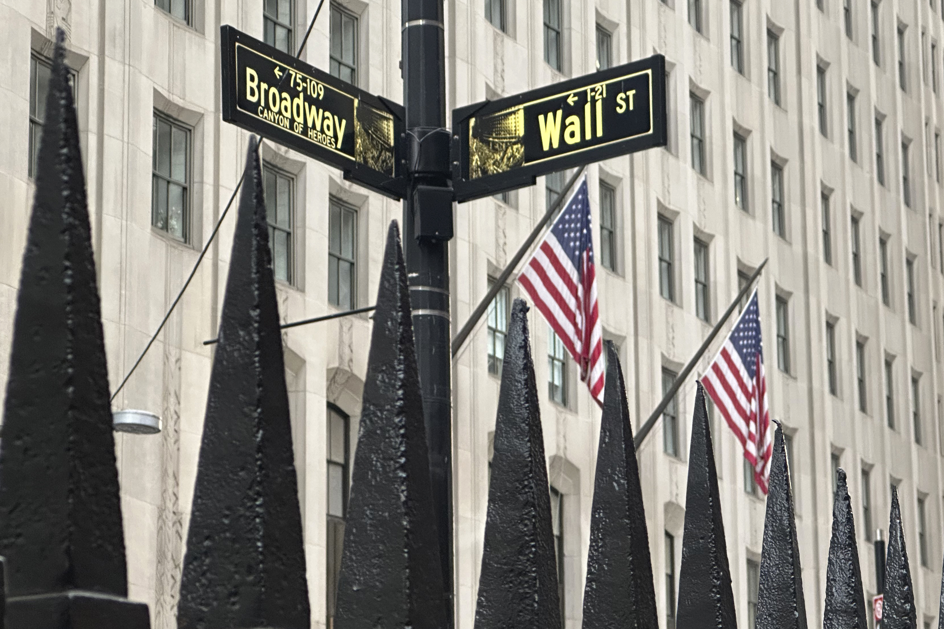 FILE - A sign marking the intersection of Broadway and Wall Street is shown in New York's Financial District on Oct. 30, 2024. (AP Photo/Peter Morgan, File)