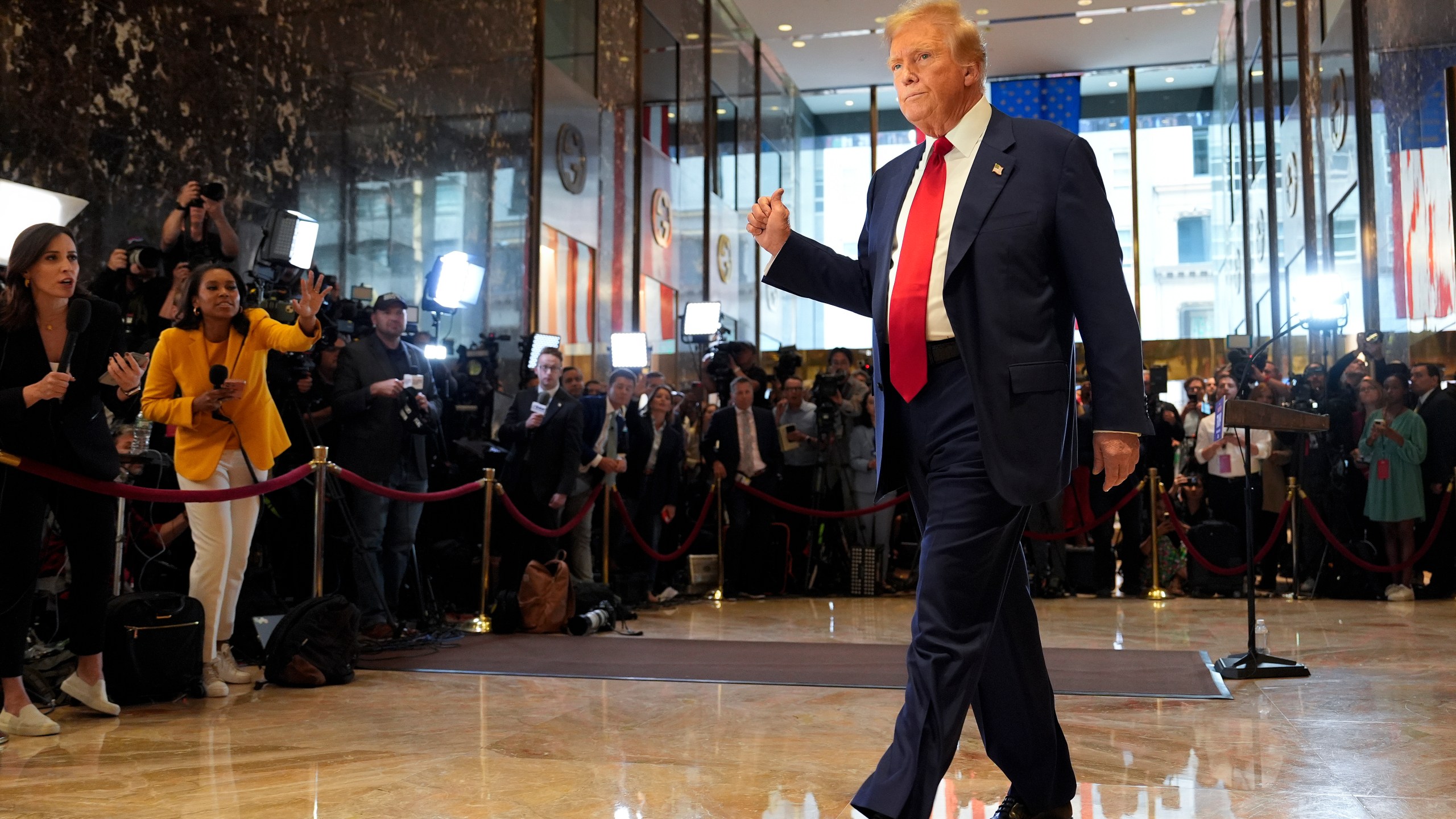 FILE - Former President Donald Trump gestures as he leaves after speaking at a news conference at Trump Tower, Friday, May 31, 2024, in New York. (AP Photo/Julia Nikhinson, File)