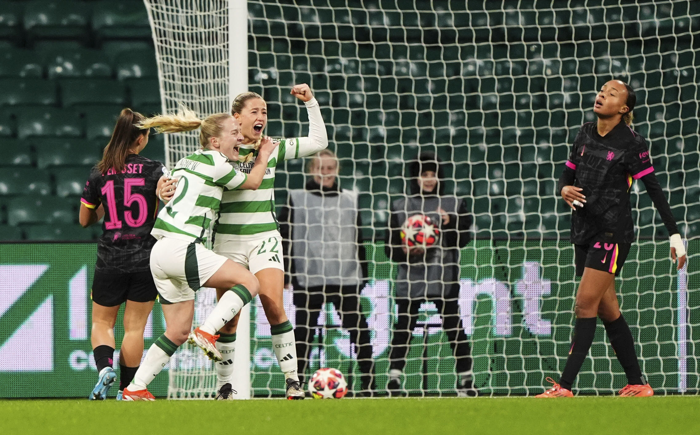 Celtic's Murphy Agnew, center, celebrates scoring her side's first goal of the game, during the Women's Champions League, group B soccer match between Celtic Women and Chelsea Women, at Celtic Park, Glasgow, Scotland, Wednesday Nov. 13, 2024. (Andrew Milligan/PA via AP)