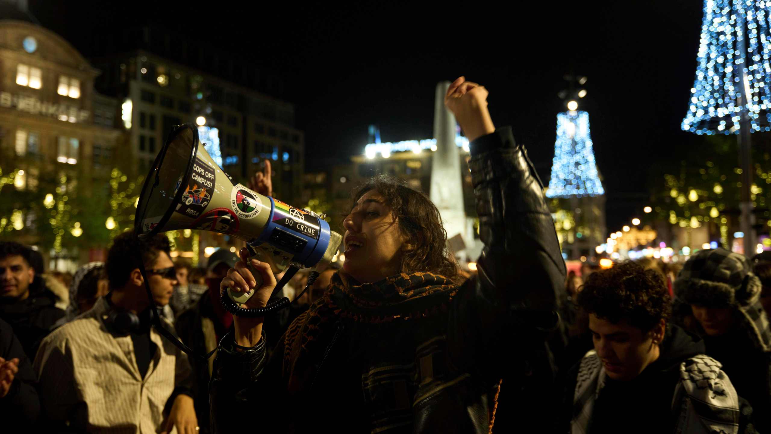 Pro-Palestinian supporters protest in Amsterdam, Netherlands, Wednesday, Nov. 13, 2024, despite a city ban on such gatherings. (AP Photo/Bram Janssen)