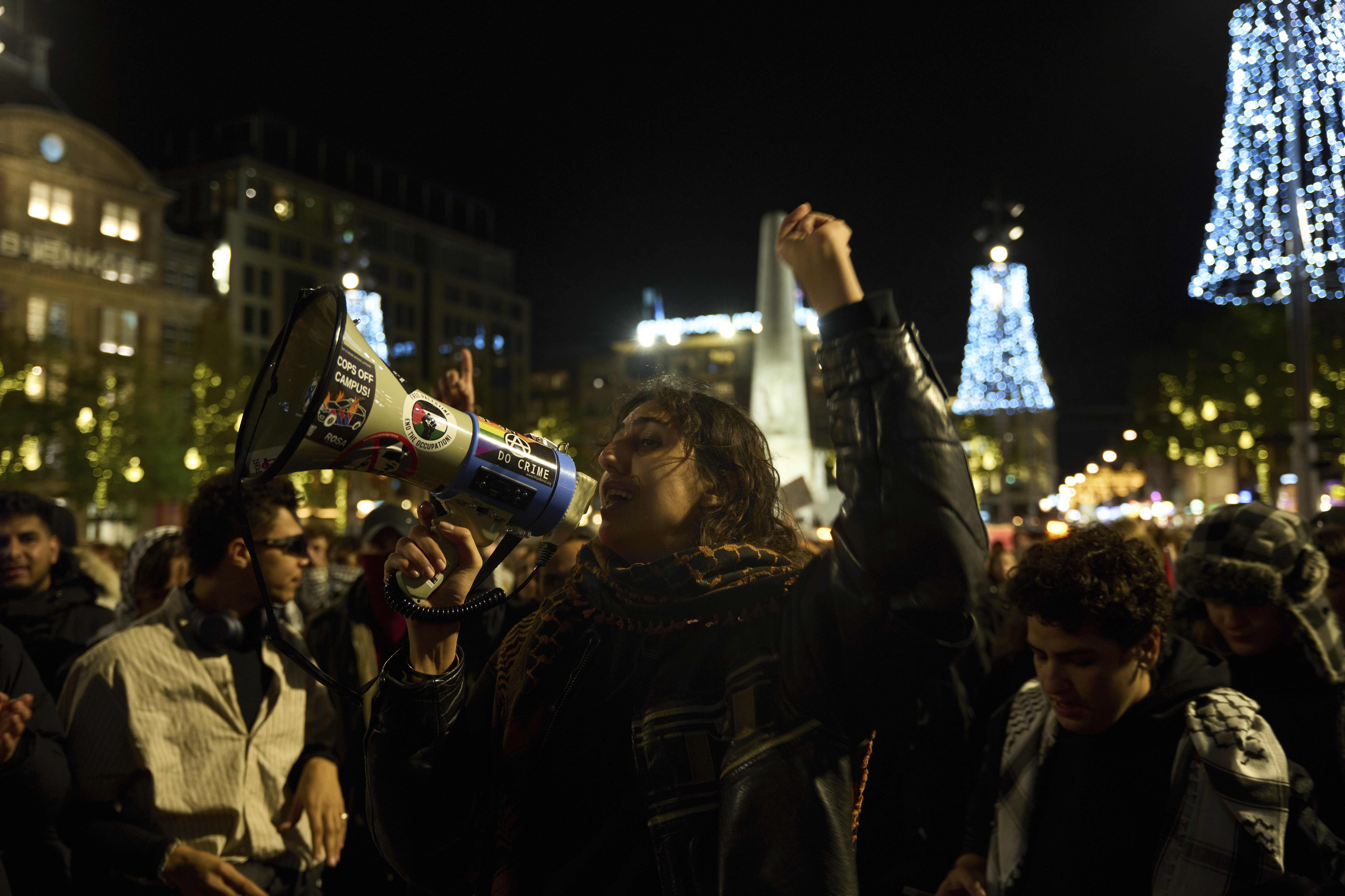 Pro-Palestinian supporters protest in Amsterdam, Netherlands, Wednesday, Nov. 13, 2024, despite a city ban on such gatherings. (AP Photo/Bram Janssen)