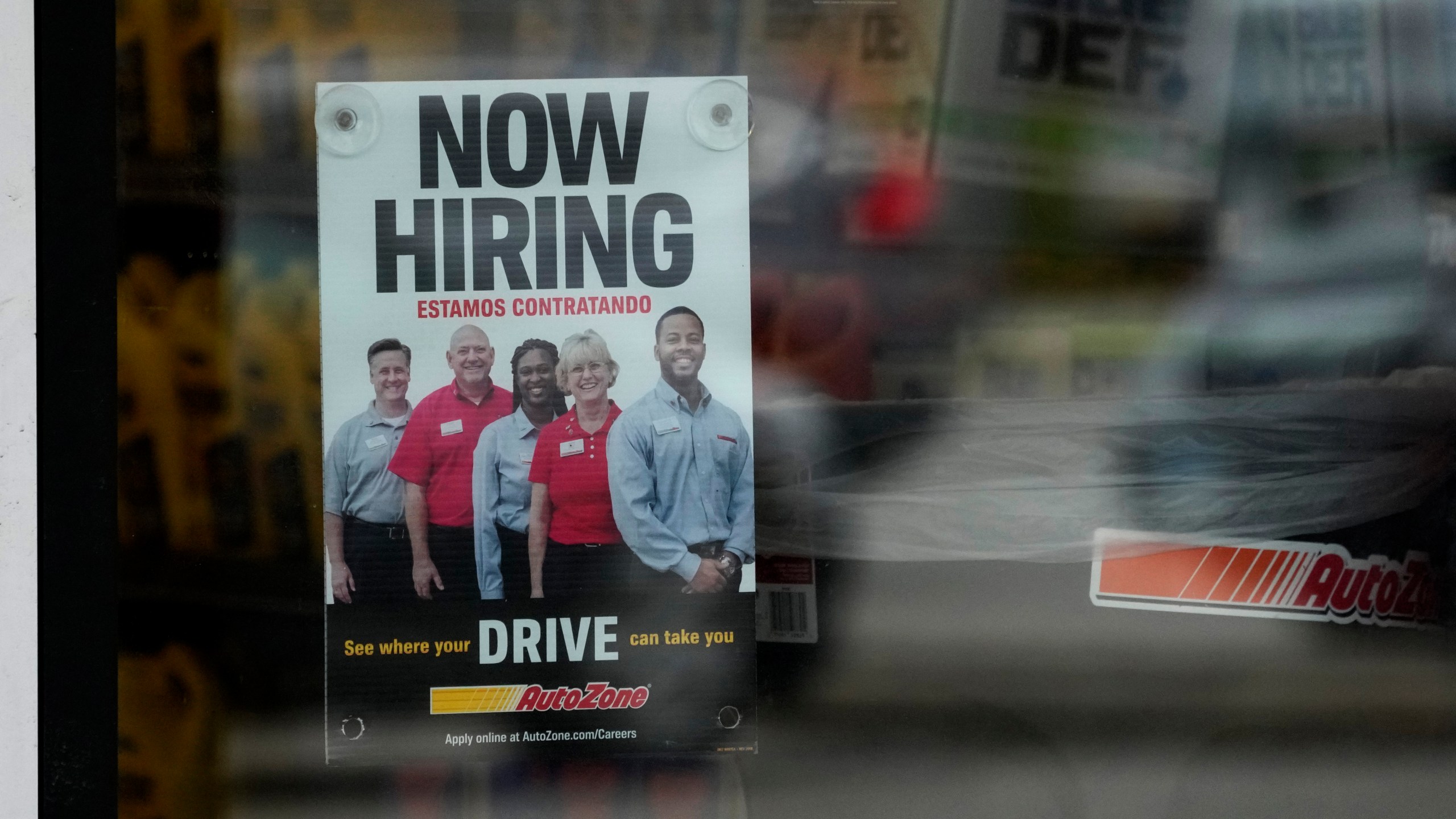 A hiring sign is displayed at a retail store in Buffalo Grove, Ill., Wednesday, Nov. 6, 2024. (AP Photo/Nam Y. Huh)