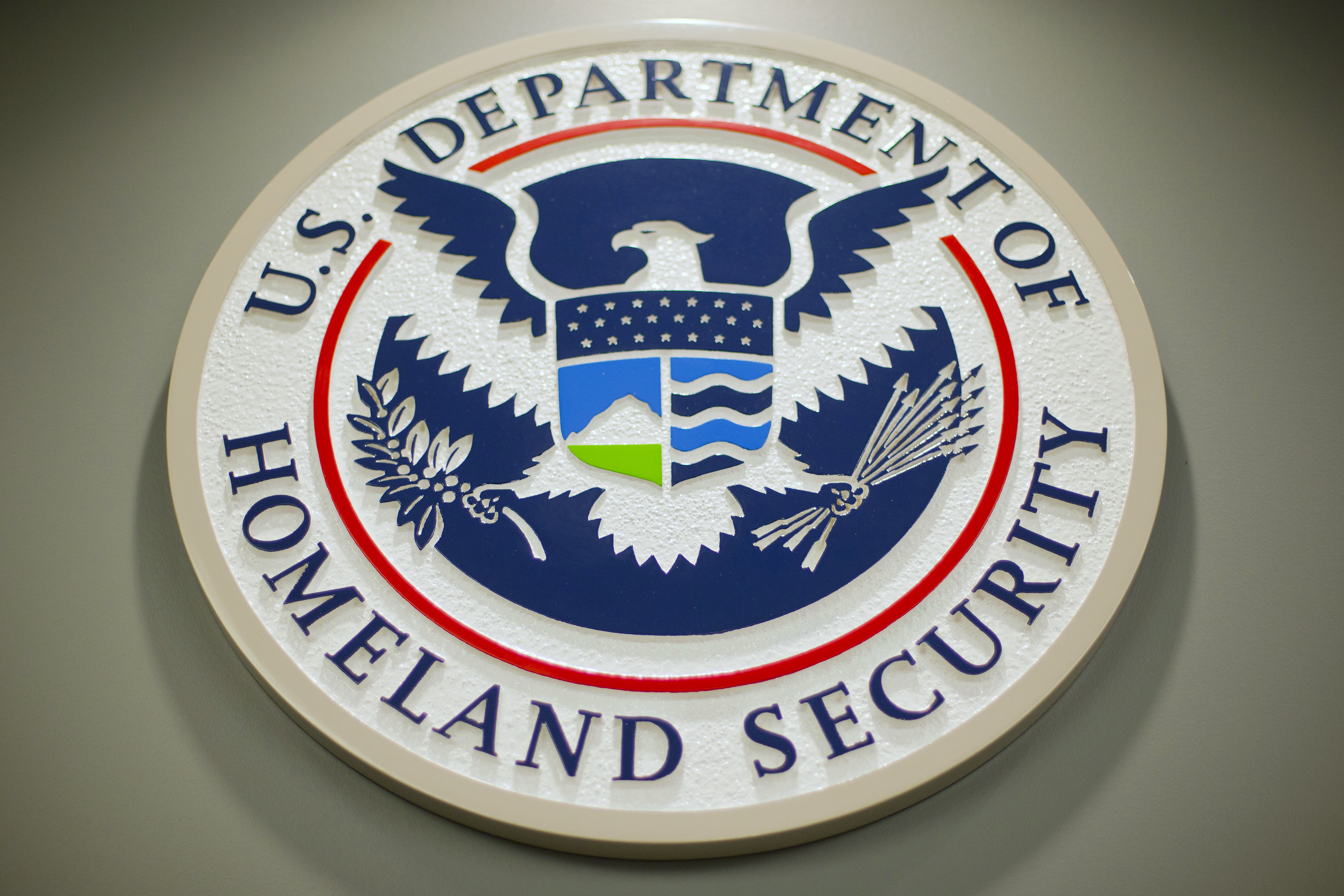 FILE - The Department of Homeland Security logo is seen during a news conference in Washington, Feb. 25, 2015. (AP Photo/Pablo Martinez Monsivais, File)