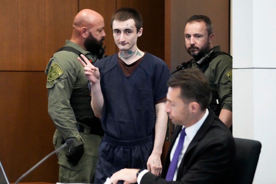 Robert E. Crimo III gestures as he attends the hearing on motions before Judge Victoria A. Rossetti at the Lake County Courthouse in Waukegan, Ill., Thursday, Nov. 14, 2024. (AP Photo/Nam Y. Huh, Pool)