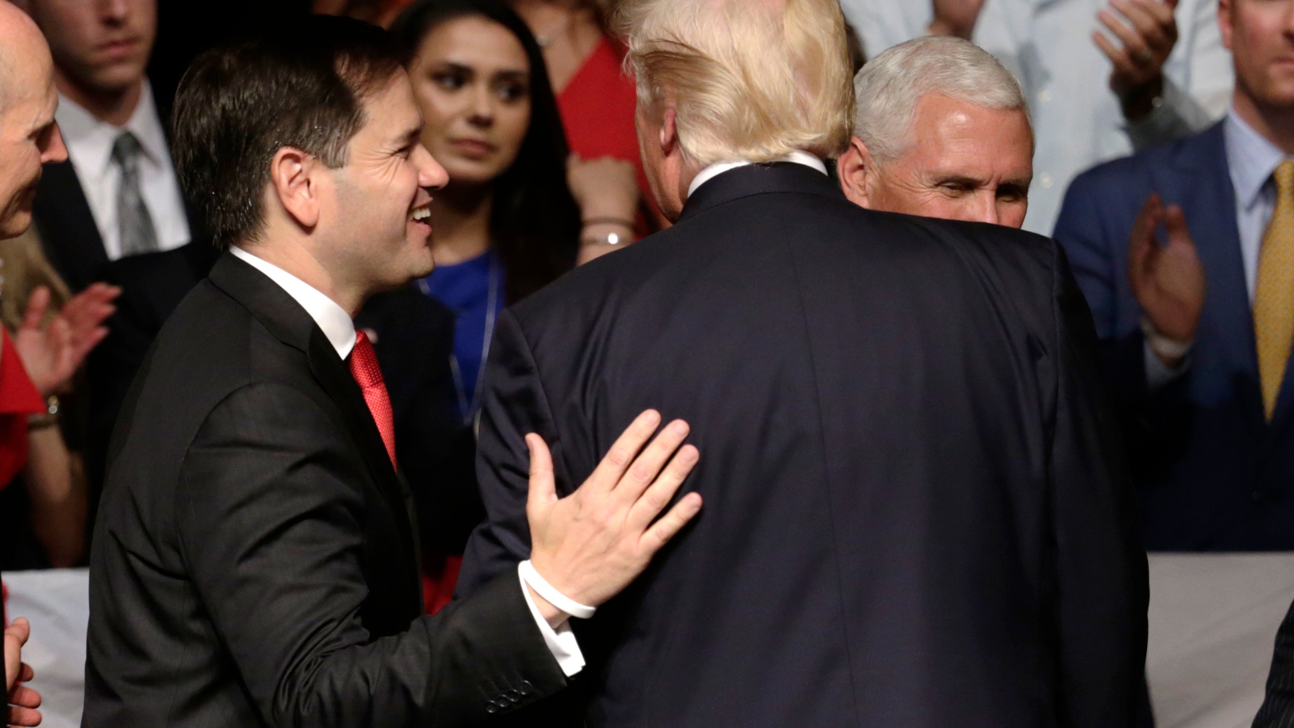 FILE - Sen. Marco Rubio, R-Fla., walks off the stage with President Donald Trump after a speech where Trump revised a Cuba policy, in Miami, June 16, 2017. (AP Photo/Lynne Sladky, File)