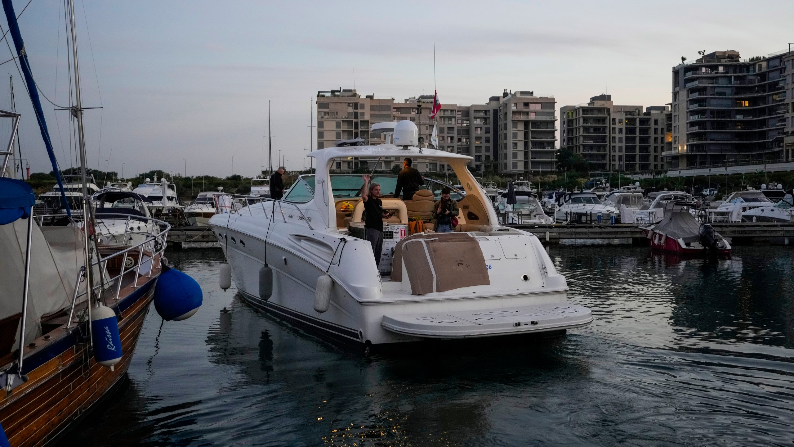 A yacht carrying Sara the lion cub leaves at the Dbayeh sea port, north of Beirut, Lebanon, Thursday, Nov. 14, 2024. (AP Photo/Hassan Ammar)