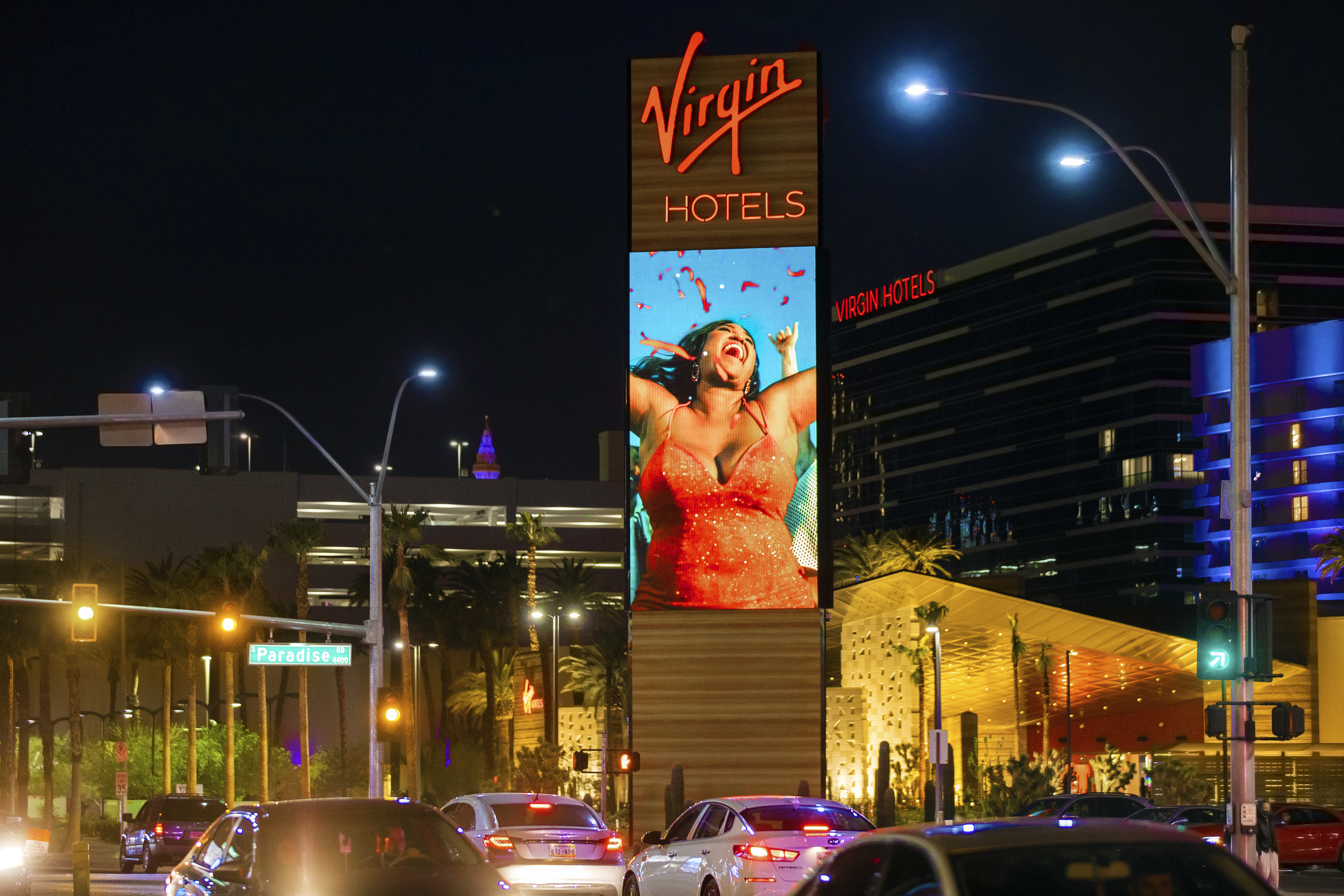 FILE - Virgin Hotels Las Vegas is illuminated on Wednesday, March 24, 2021, in Las Vegas. (Benjamin Hager/Las Vegas Review-Journal via AP, File)