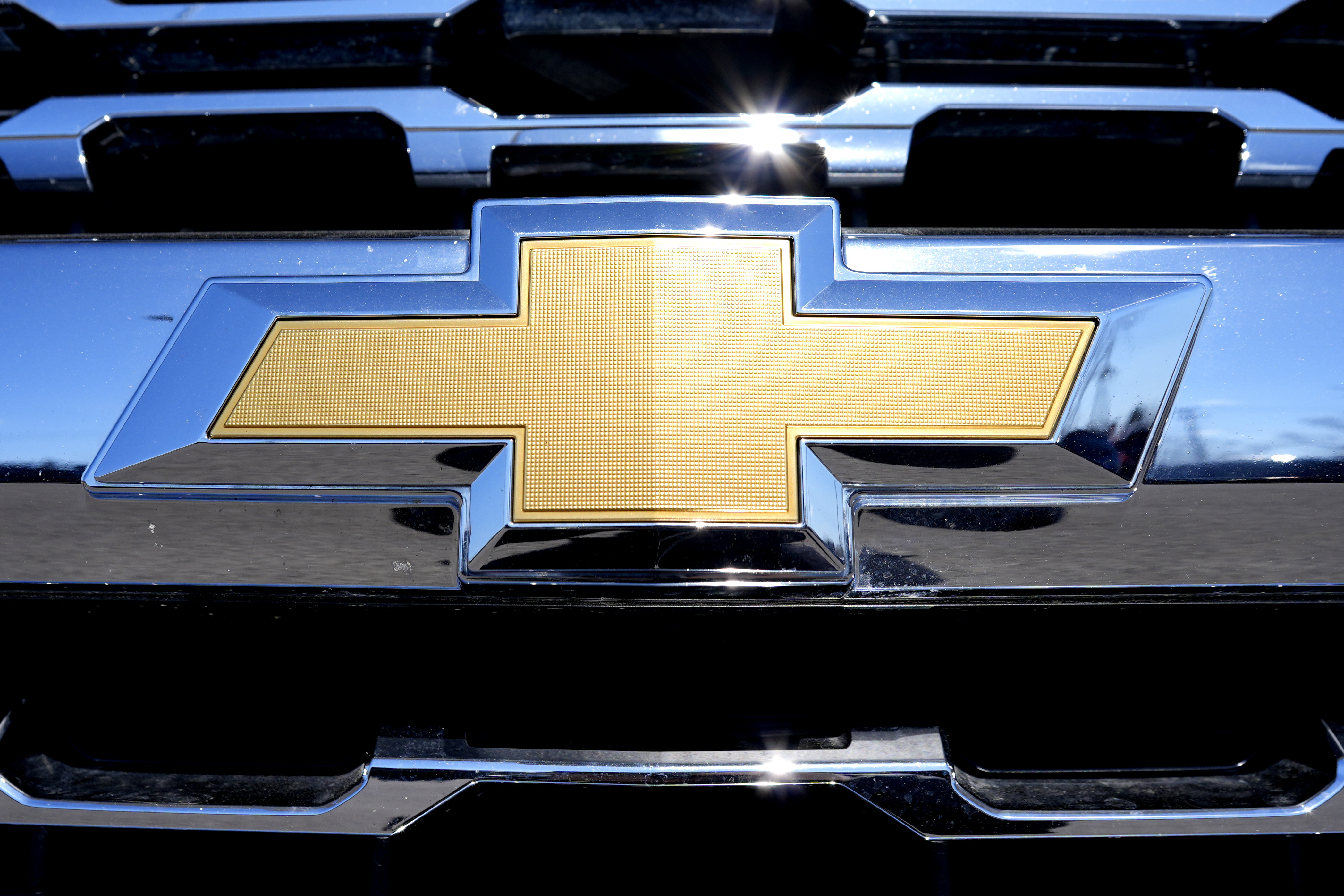 FILE - The Chevrolet logo is seen at a new and used vehicles dealership in Palatine, Ill., on March 20, 2024. (AP Photo/Nam Y. Huh)