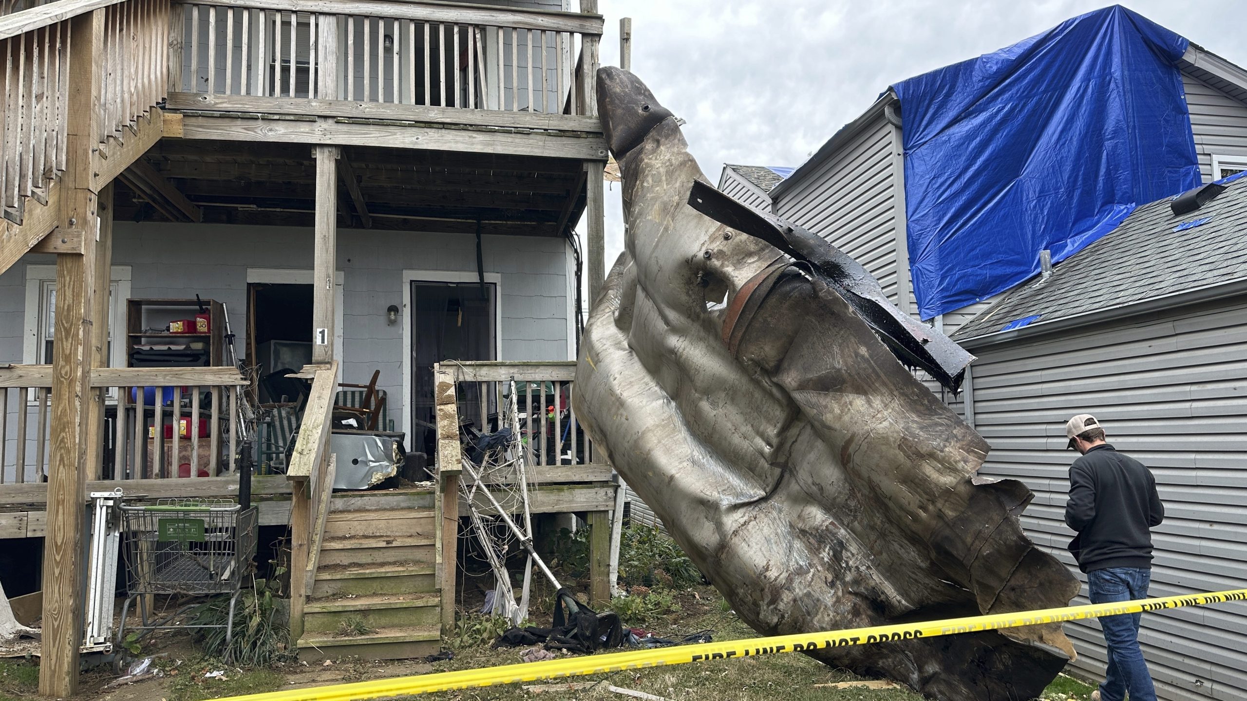 A massive piece of debris that flew from the Givaudan Color Sense plant after an explosion is pictured on Wednesday, Nov. 13, 2024 in Louisville, Ky. (AP Photo/Dylan Lovan)