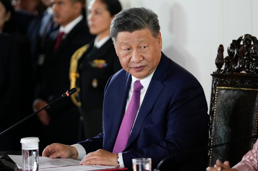 Chinese President Xi Jinping looks on during a ceremony to virtually inaugurate a Chinese-funded port in the city of Chancay, at the government palace in Lima, Peru, Thursday, Nov. 14, 2024. (AP Photo/Fernando Vergara)