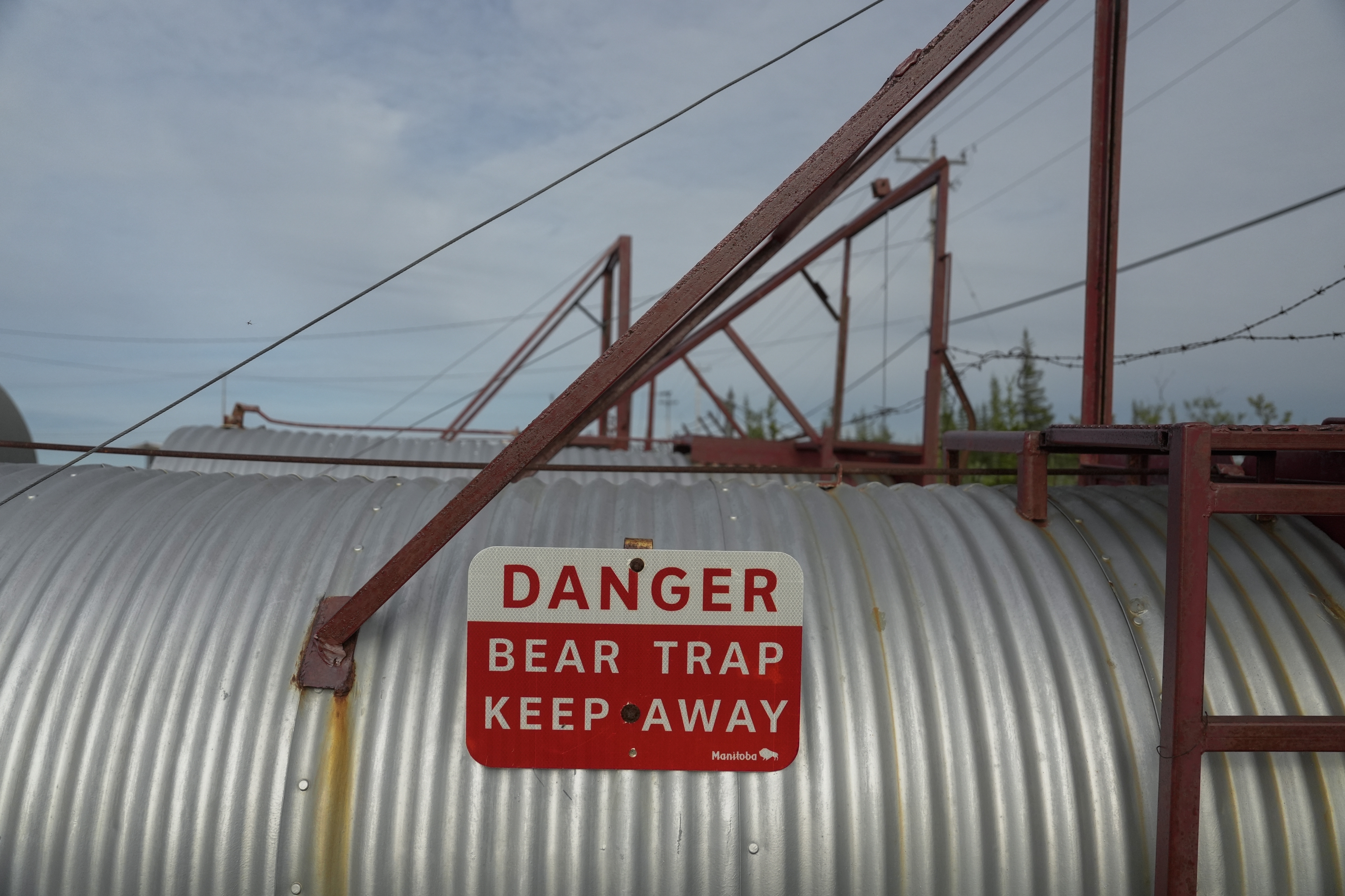 A polar bear trap sits outside the Polar Bear Holding Facility, Sunday, Aug. 4, 2024, in Churchill, Manitoba. (AP Photo/Joshua A. Bickel)