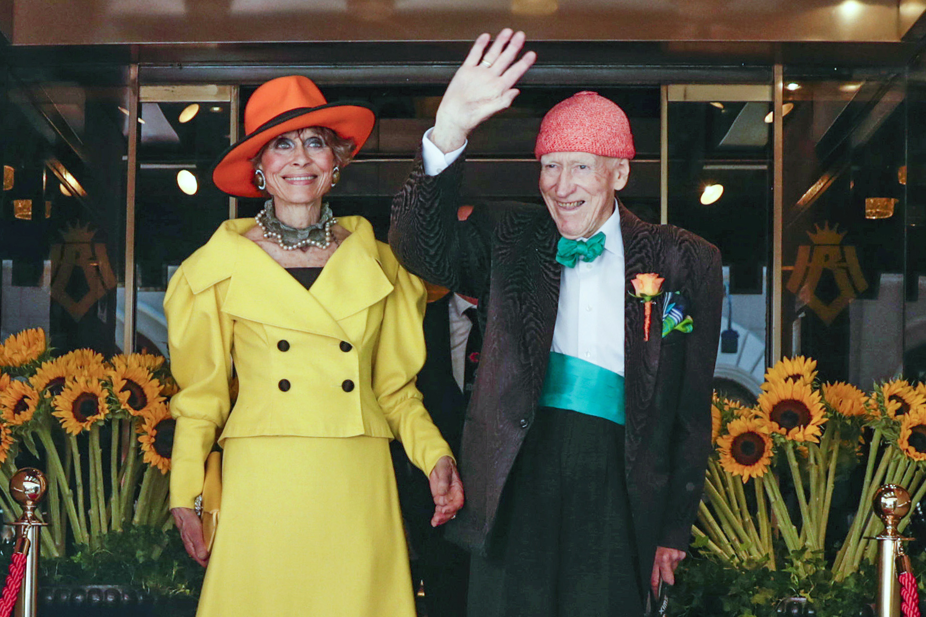 FILE - 95 year old businessman and billionaire Olav Thon, right poses for a photo with Sissel Berdal Haga, after their wedding at Hotel Bristol in Oslo, Friday, June 21, 2019. (Berit Roald/NTB Scanpix via AP, File)