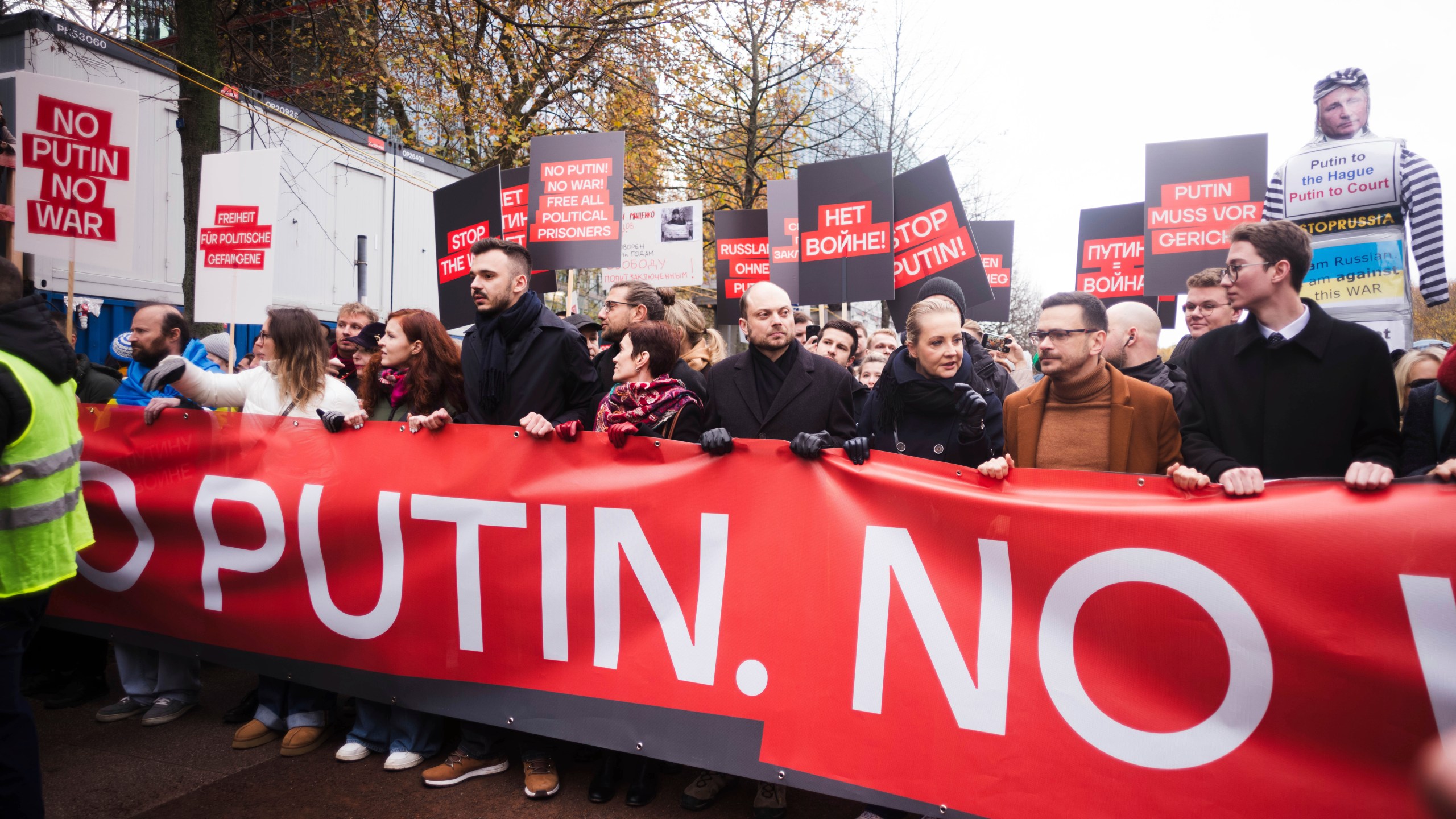 Yulia Navalnaya, third from right, leads with Russian opposition politics Vladimir Kara-Murza, center, and Ilya Yashin, second from right, a demonstration under the slogan "Stop Putin! Stop the War! Freedom for Political Prisoners!" in Berlin, Germany, Sunday, Nov. 17, 2024. (AP Photo/Markus Schreiber)