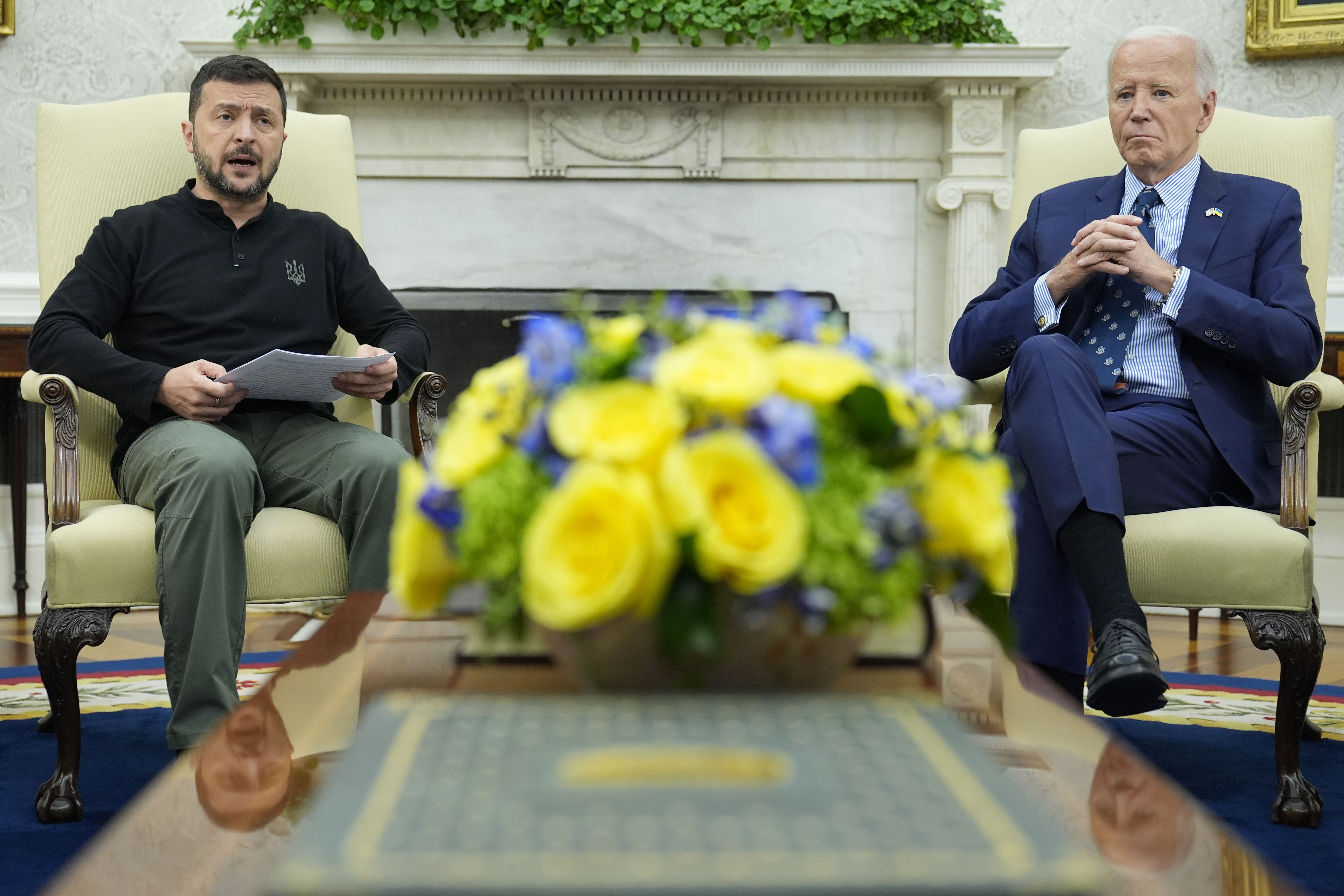 FILE - President Joe Biden, right, listens as Ukraine's President Volodymyr Zelenskyy, left, speaks during their meeting in the Oval Office of the White House in Washington, Sept. 26, 2024. (AP Photo/Susan Walsh, File)