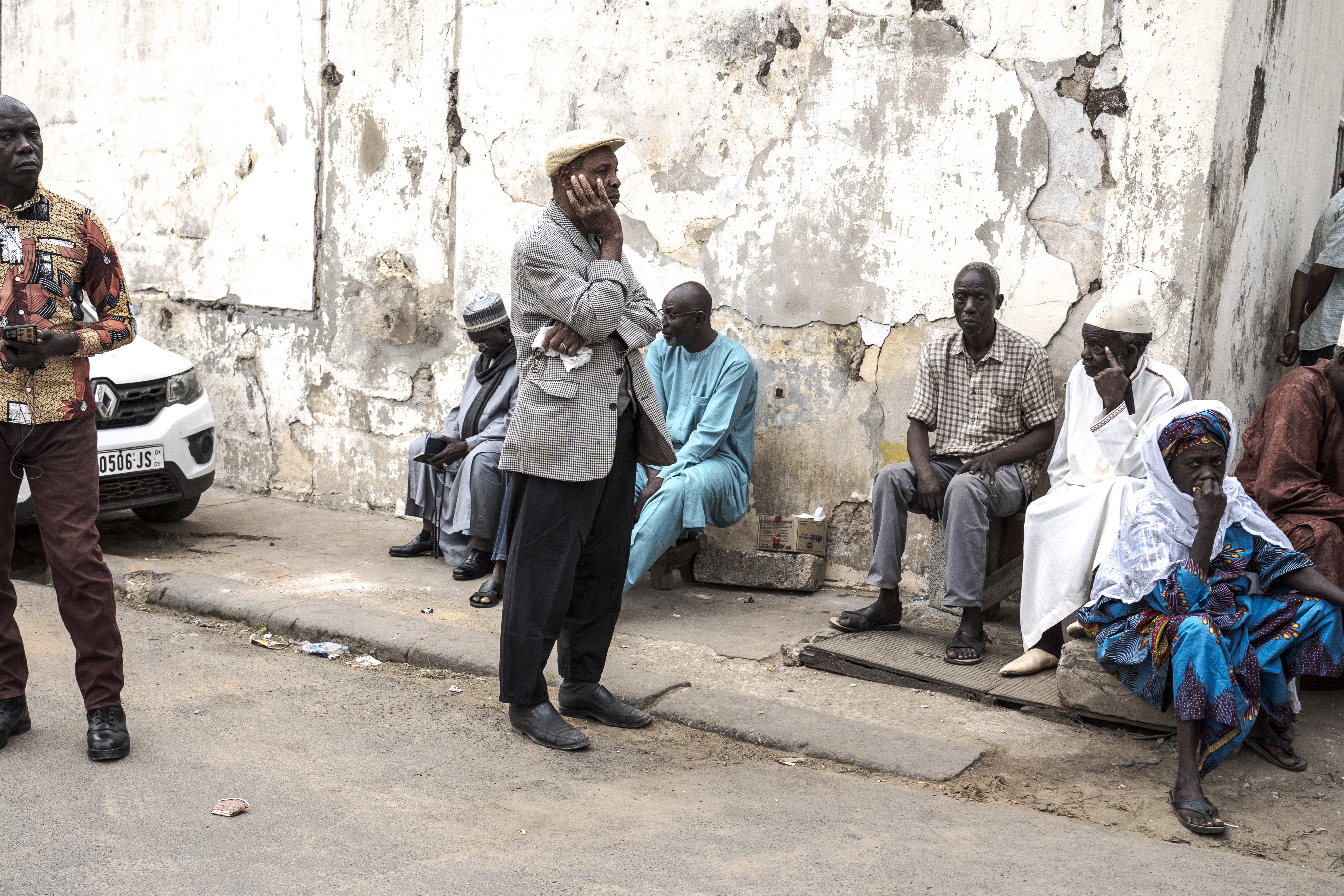 People wait to cast their ballot for legislative elections in Dakar, Senegal Sunday, Nov. 17, 2024. (AP Photo/Annika Hammerschlag)