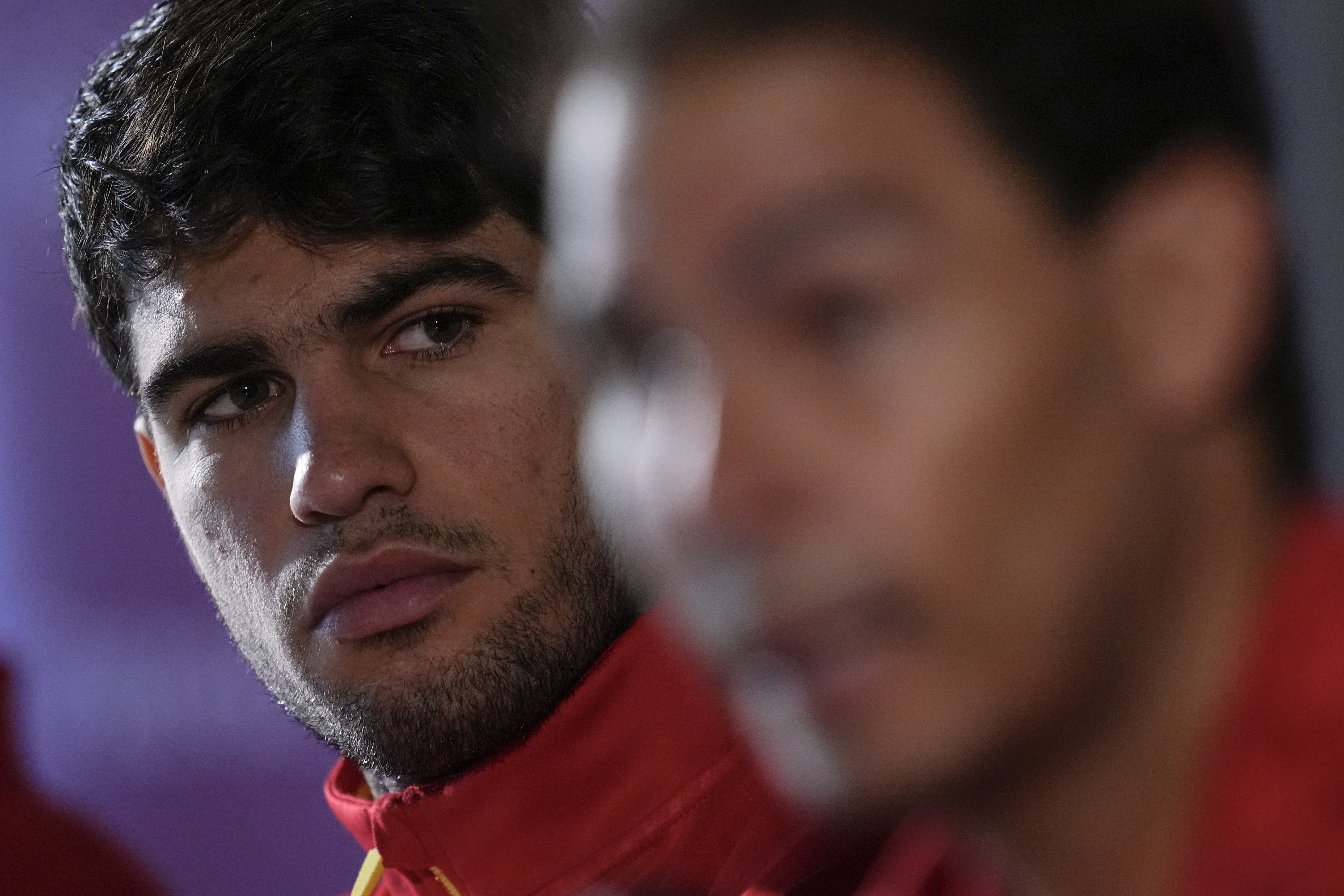 Spain's tennis player Carlos Alcaraz, left, and Rafael Nadal attends a press conference in Fuengirola, southern Spain, on Monday, Nov. 18, 2024. (AP Photo/Manu Fernandez)