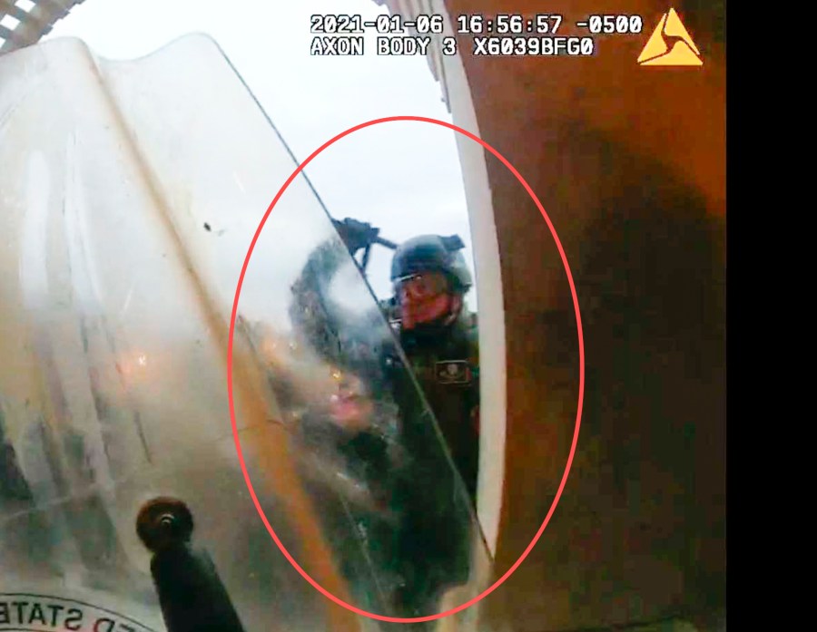 This image from police body-worn camera video, contained and annotated in the Justice Department's statement of facts, supporting the arrest warrant for Edward Richmond Jr., at the U.S. Capitol on Jan. 6, 2021, in Washington. (Department of Justice via AP)