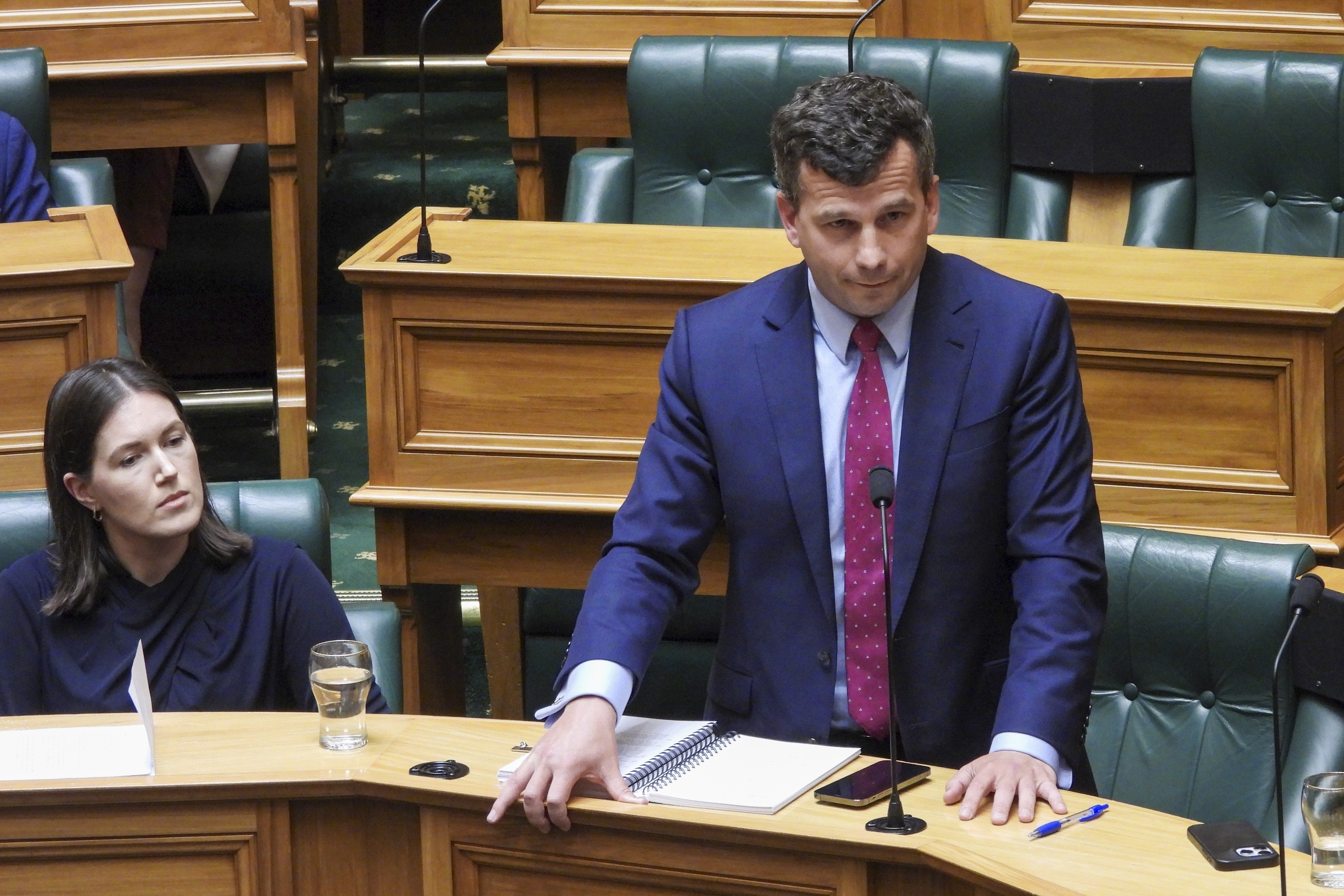 FILE - ACT Party leader David Seymour stands during the first debate on the Treaty Principles Bill in Parliament in Wellington, New Zealand, Thursday, Nov. 14, 2024. (AP Photo/Charlotte Graham-McLay, File)