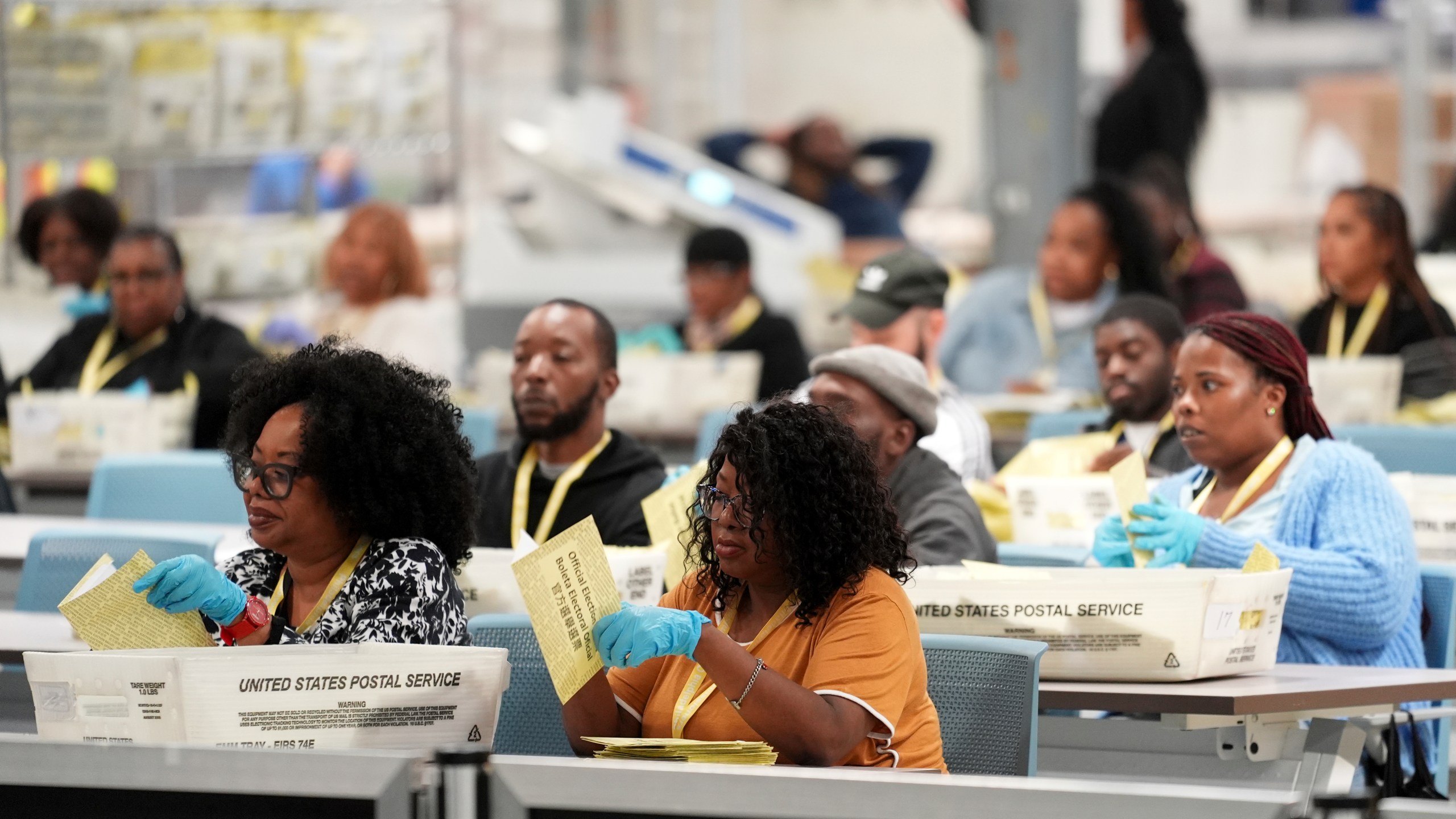 Election workers process mail-in ballots for the 2024 General Election at the Philadelphia Election Warehouse, Tuesday, Nov. 5, 2024, in Philadelphia. (AP Photo/Matt Rourke)