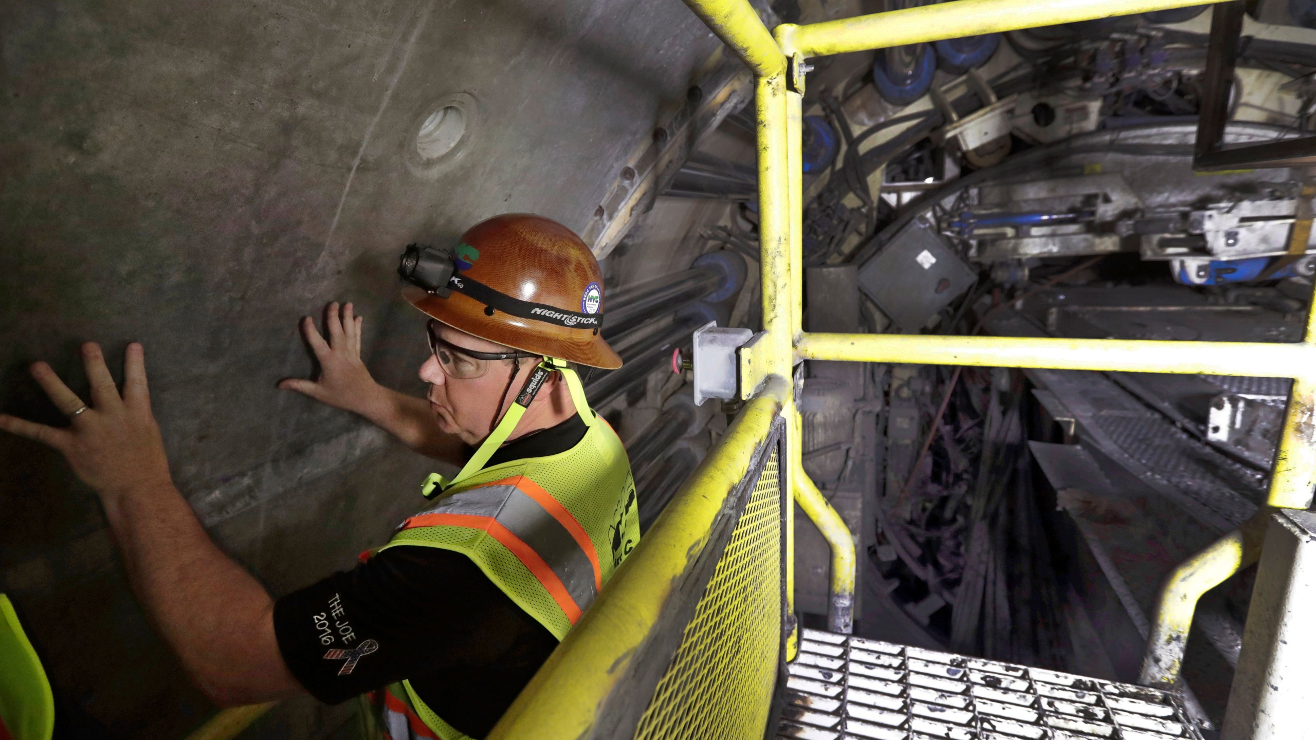 FILE - Mike Schmitt, project manager for the New York State Department of Environmental Protection, explains the design and construction of a 2.5-mile bypass tunnel for the Delaware Aqueduct in Marlboro, N.Y., May 16, 2018. (AP Photo/Julie Jacobson, File)