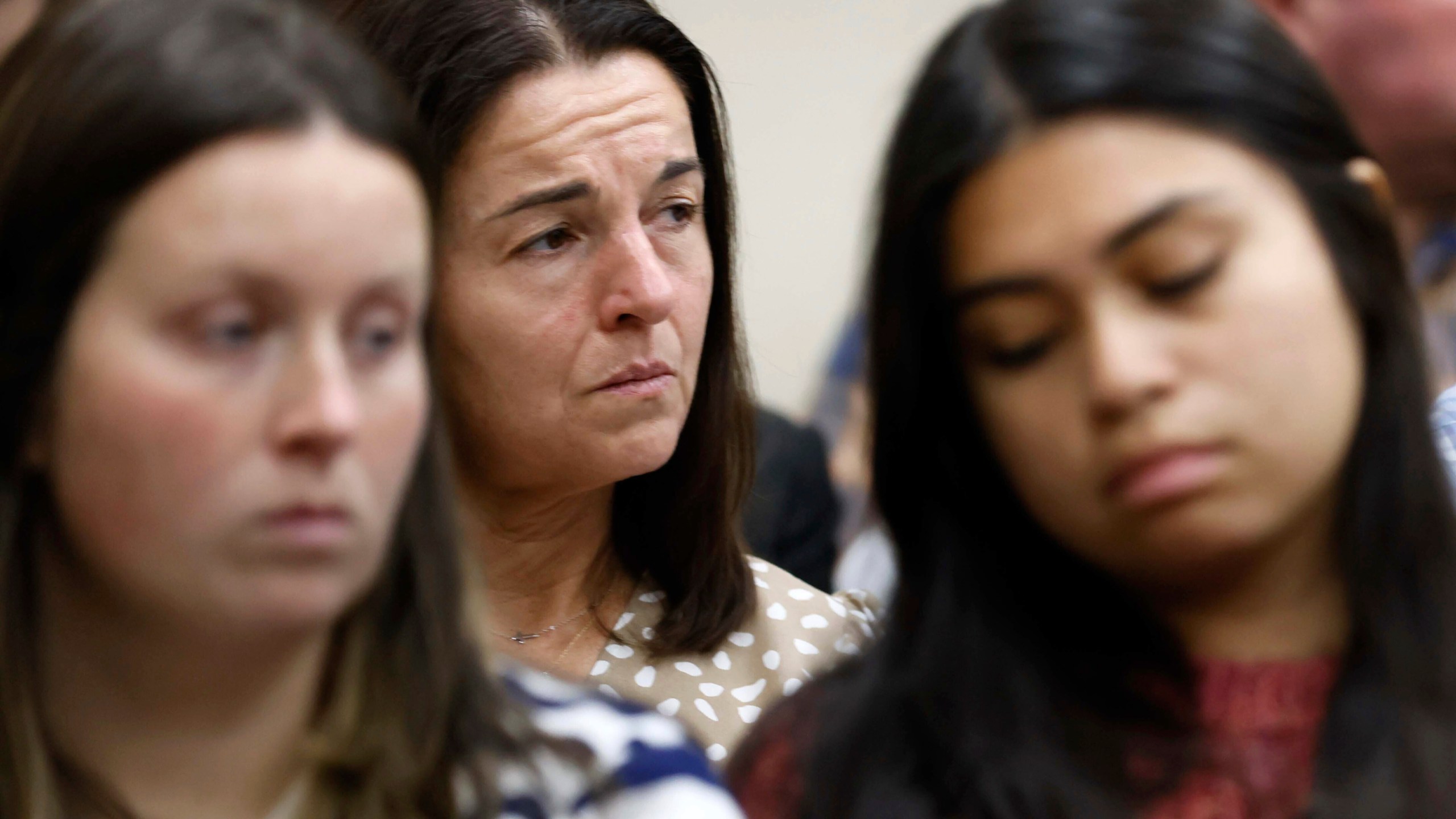 Allyson Phillips, mother of Laken Riley, second left, listens during the trial of Jose Ibarra at Athens-Clarke County Superior Court on Monday, Nov. 18, 2024, in Athens, Ga. (Miguel Martinez/Atlanta Journal-Constitution via AP, Pool)