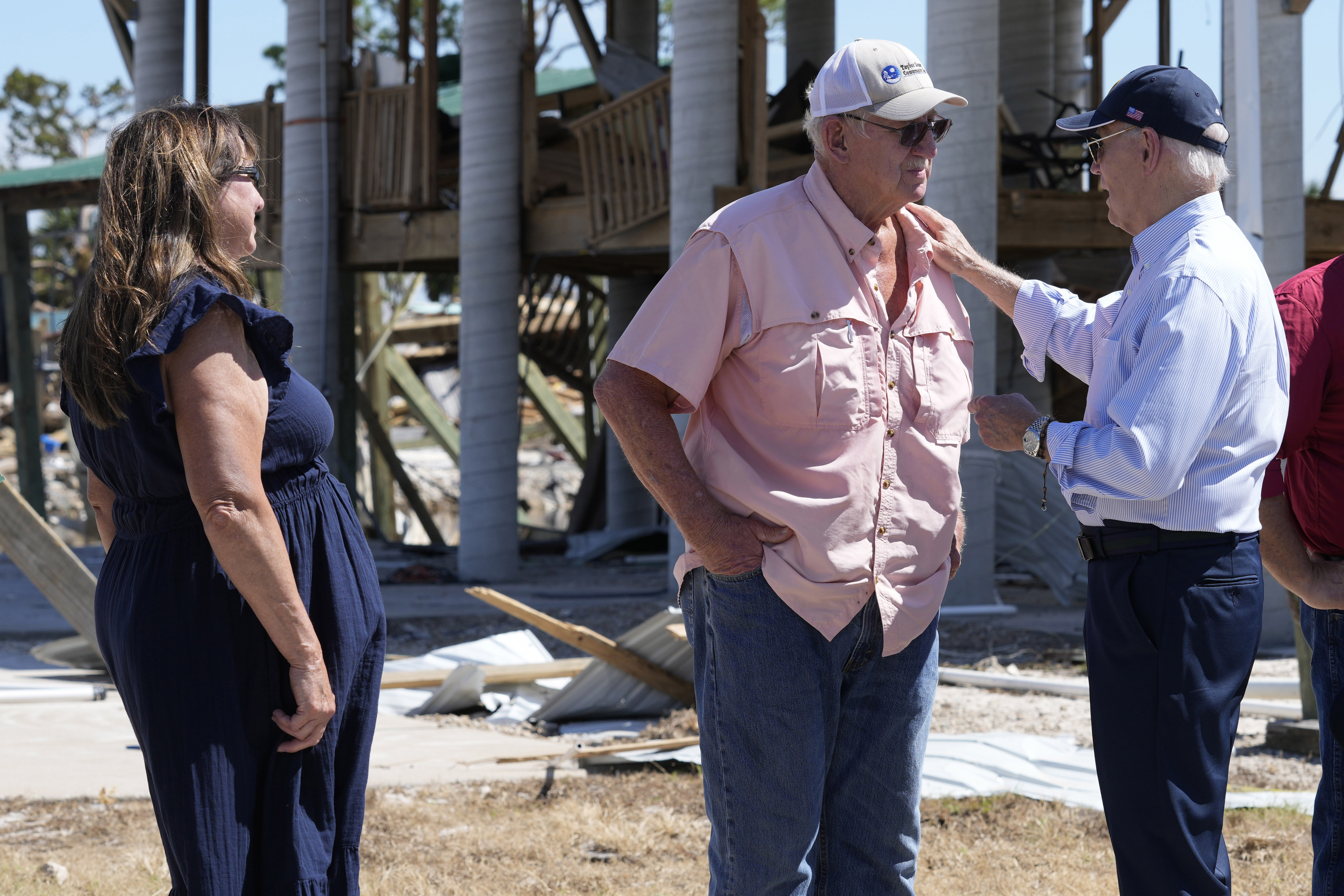 FILE - President Joe Biden, right, greets people in Keaton Beach, Fla., Oct. 3, 2024, during his tour of areas impacted by Hurricane Helene. (AP Photo/Susan Walsh, File)