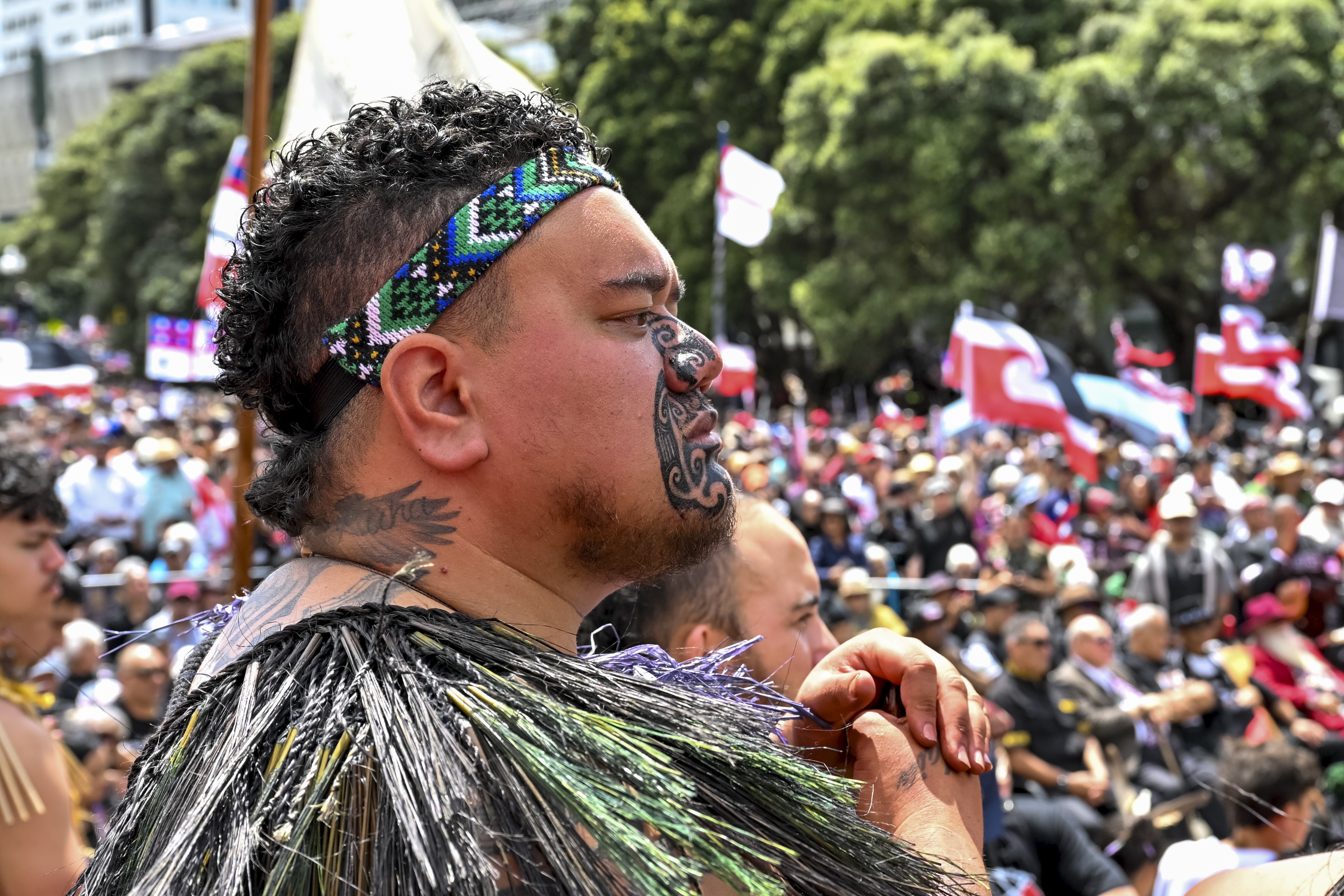 Thousands of people gather outside New Zealand's parliament to protest a proposed law that would redefine the country's founding agreement between Indigenous Māori and the British Crown, in Wellington Tuesday, Nov. 19, 2024. (AP Photo/Mark Tantrum)