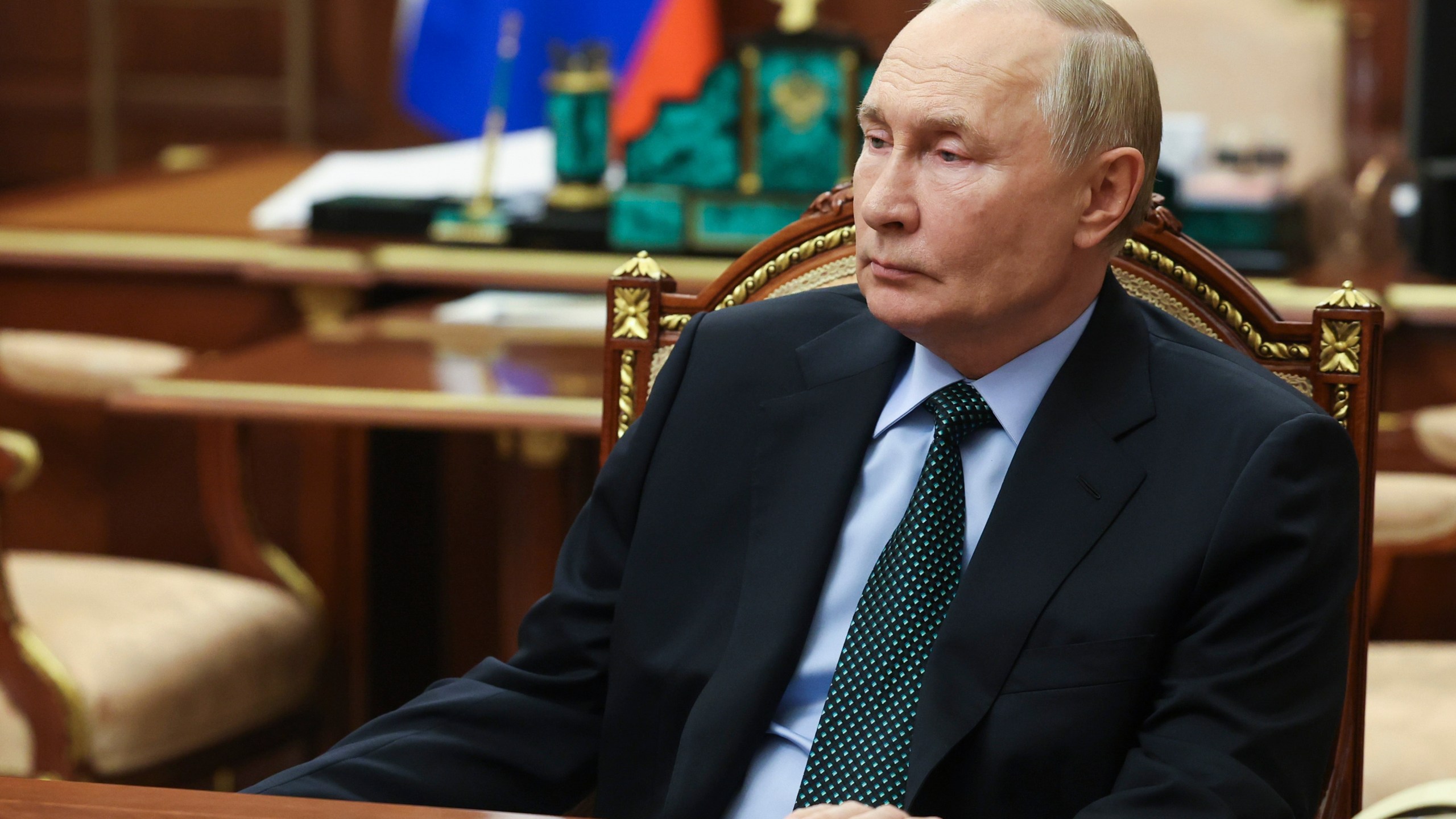 Russian President Vladimir Putin listens to Moscow-appointed head of Russian-controlled Zaporizhzhia region of Ukraine, Yevgeny Balitsky during their meeting at the Kremlin in Moscow, Russia, Monday, Nov. 18, 2024. (Vyacheslav Prokofyev, Sputnik, Kremlin Pool Photo via AP)