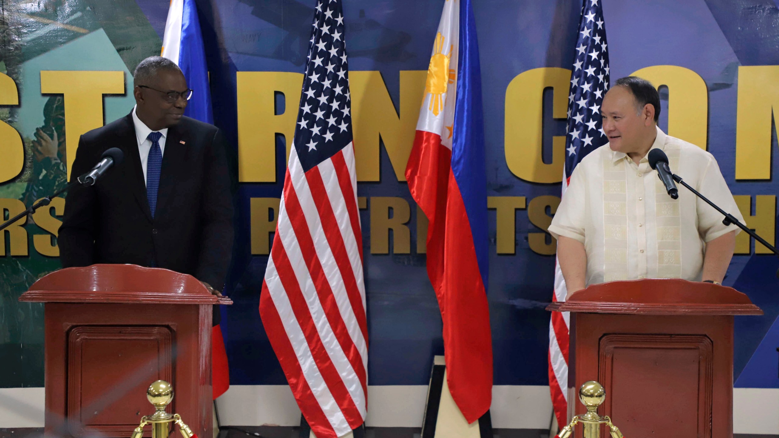 In this photo provided by Philippine Department of National Defense, United States Defense Secretary Lloyd Austin, left, holds a joint press conference with Philippine Defense Secretary Gilberto Teodoro at the Philippines Western Command (WESCOM) to discuss bilateral ties in Palawan, Philippines Tuesday, Nov. 19, 2024. (Philippine Department of National Defense via AP)