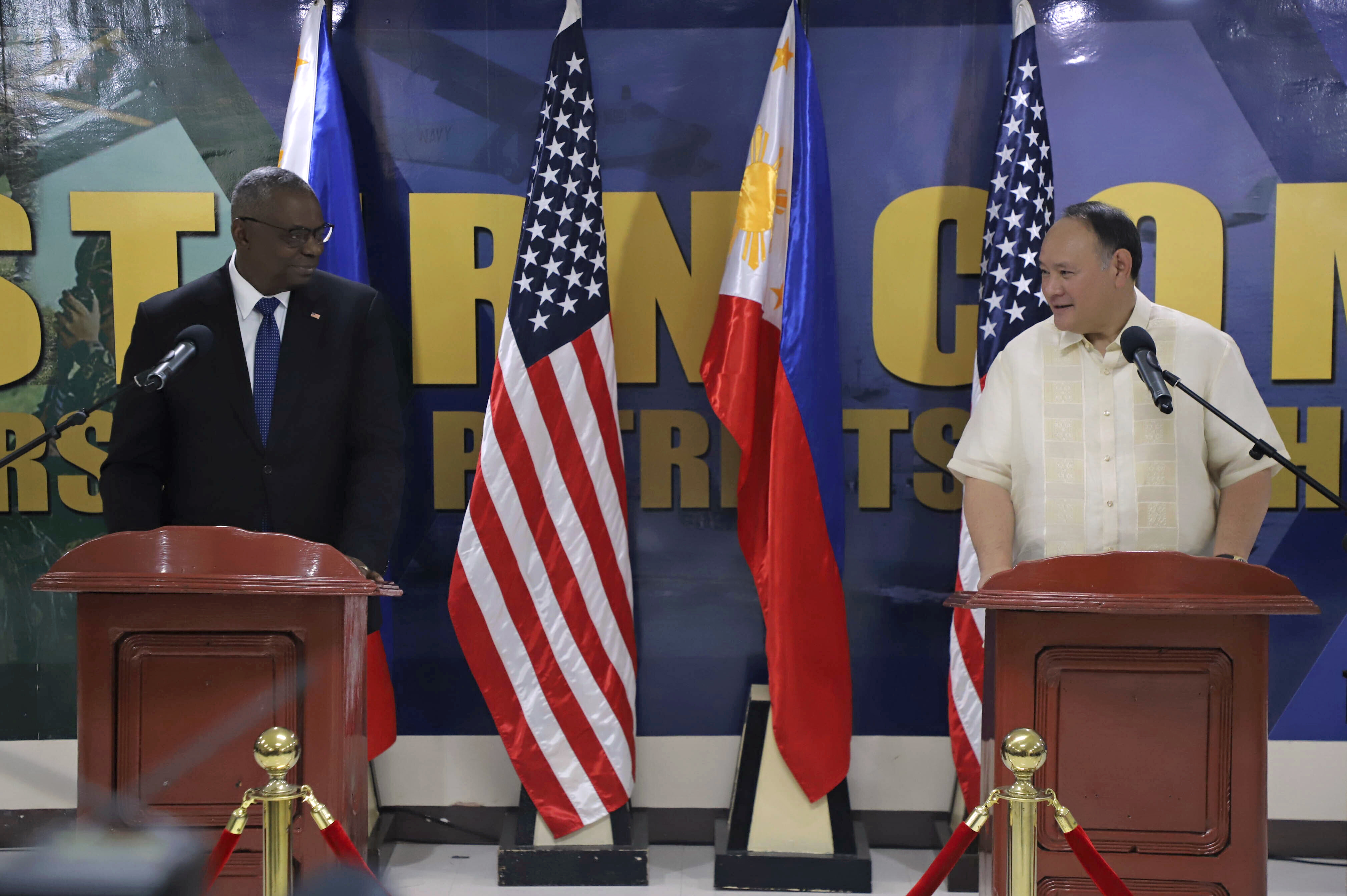 In this photo provided by Philippine Department of National Defense, United States Defense Secretary Lloyd Austin, left, holds a joint press conference with Philippine Defense Secretary Gilberto Teodoro at the Philippines Western Command (WESCOM) to discuss bilateral ties in Palawan, Philippines Tuesday, Nov. 19, 2024. (Philippine Department of National Defense via AP)