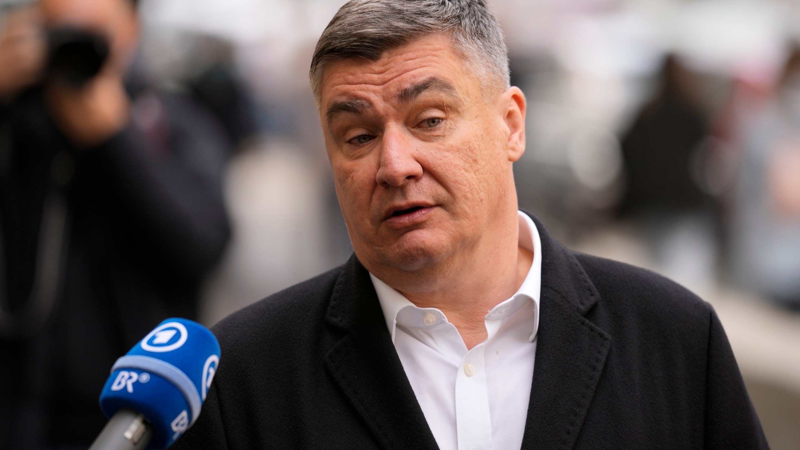 FILE - Croatia's President Zoran Milanovic addresses the media outside a polling station after casting his vote in Zagreb, Croatia, April 17, 2024. (AP Photo/Darko Bandic, File)