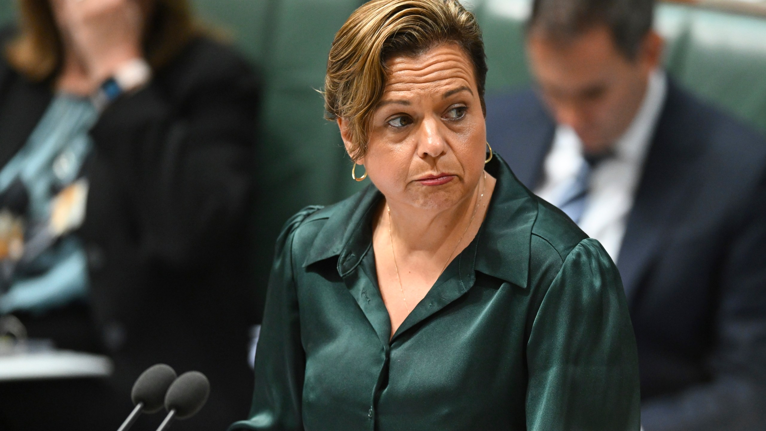 Australian Communications Minister Michelle Rowland speaks during House of Representatives Question Time at Parliament House in Canberra, Monday, Nov.18, 2024. (Lukas Coch/AAP Image via AP)