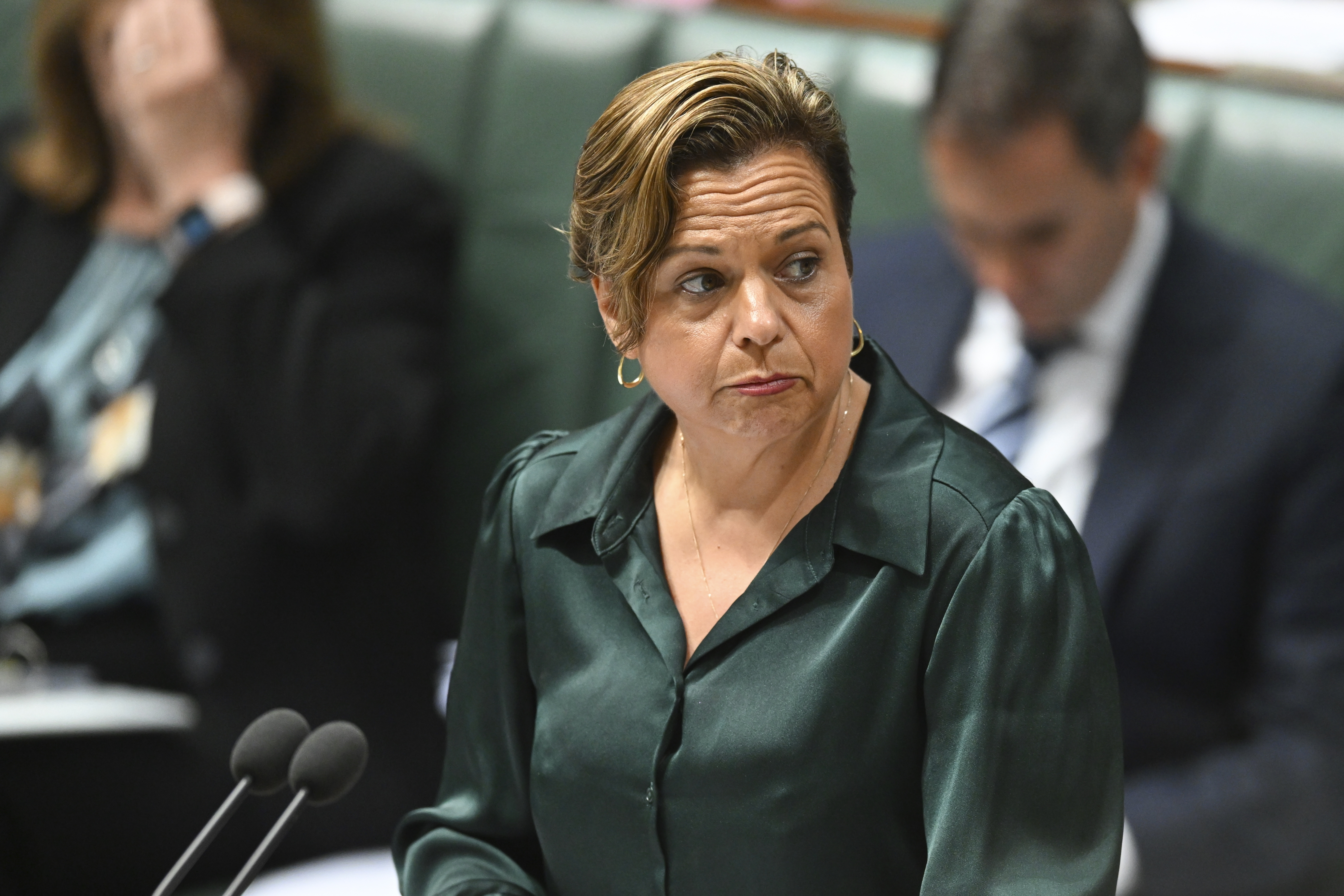 Australian Communications Minister Michelle Rowland speaks during House of Representatives Question Time at Parliament House in Canberra, Monday, Nov.18, 2024. (Lukas Coch/AAP Image via AP)